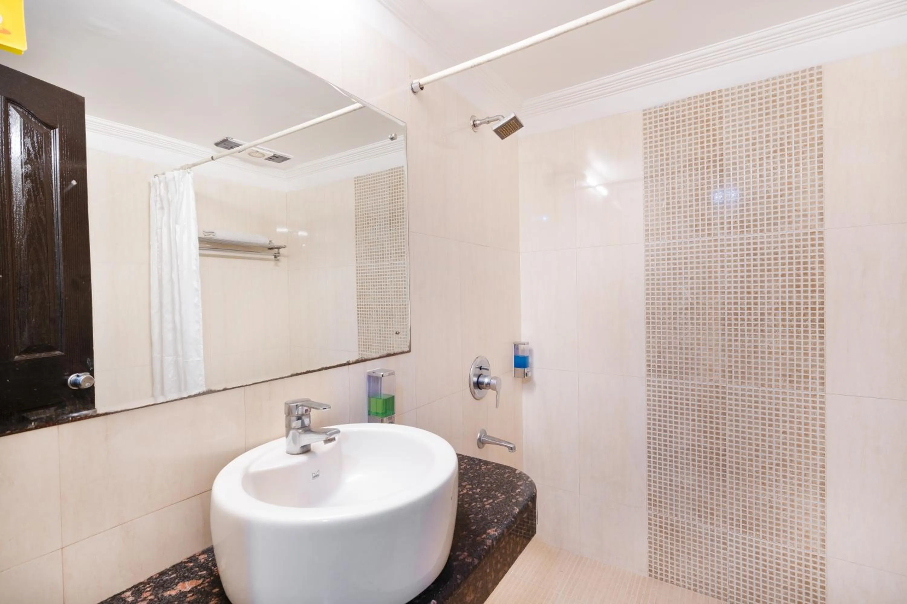 Shower in Skylark Hotel by Gabrian Hotels