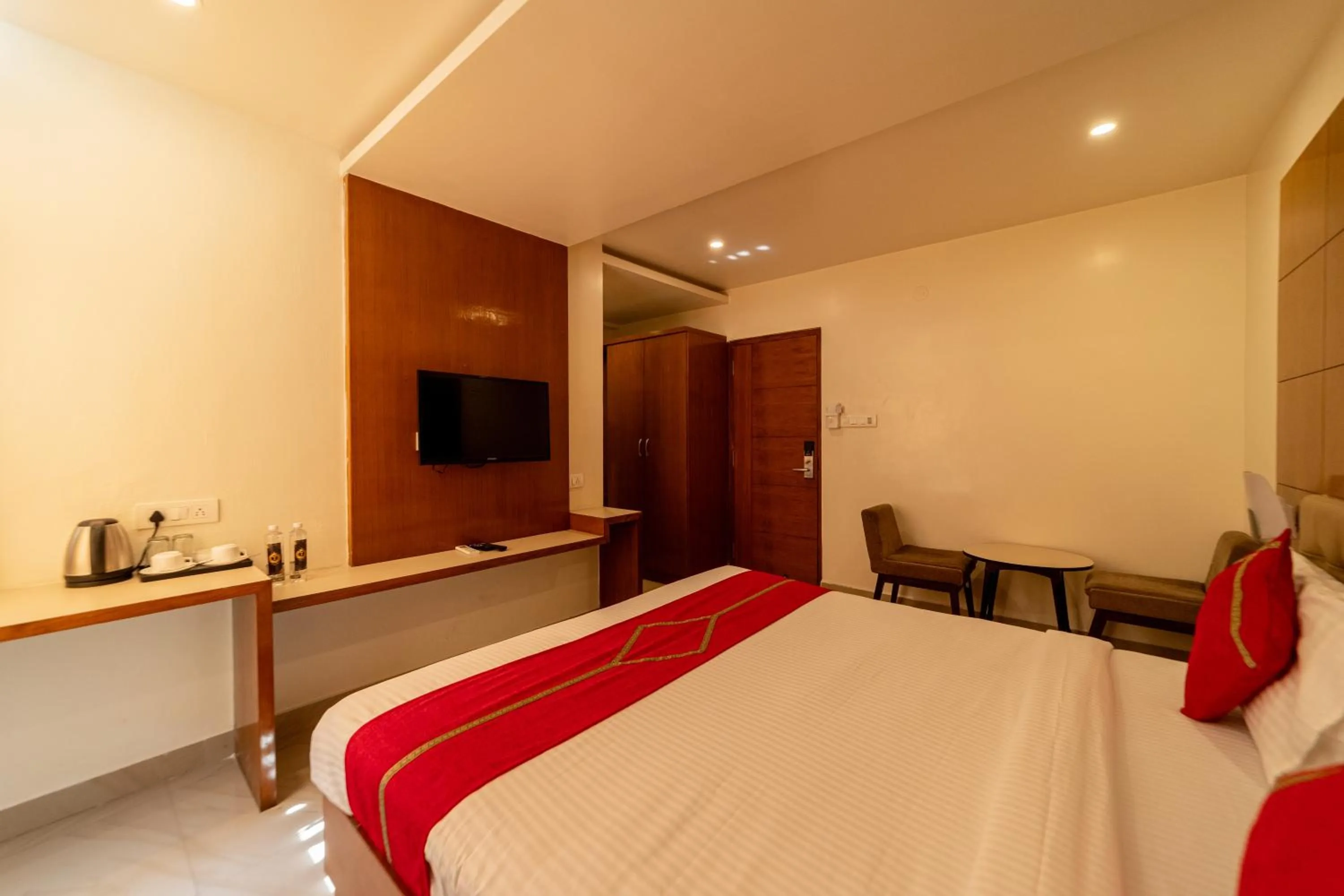 Bedroom, Bed in Tetrad Hotels - International Airport Road Hebbal