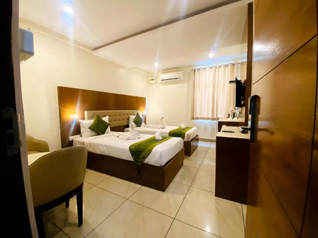 Bedroom, Bed in Tetrad Hotels - International Airport Road Hebbal