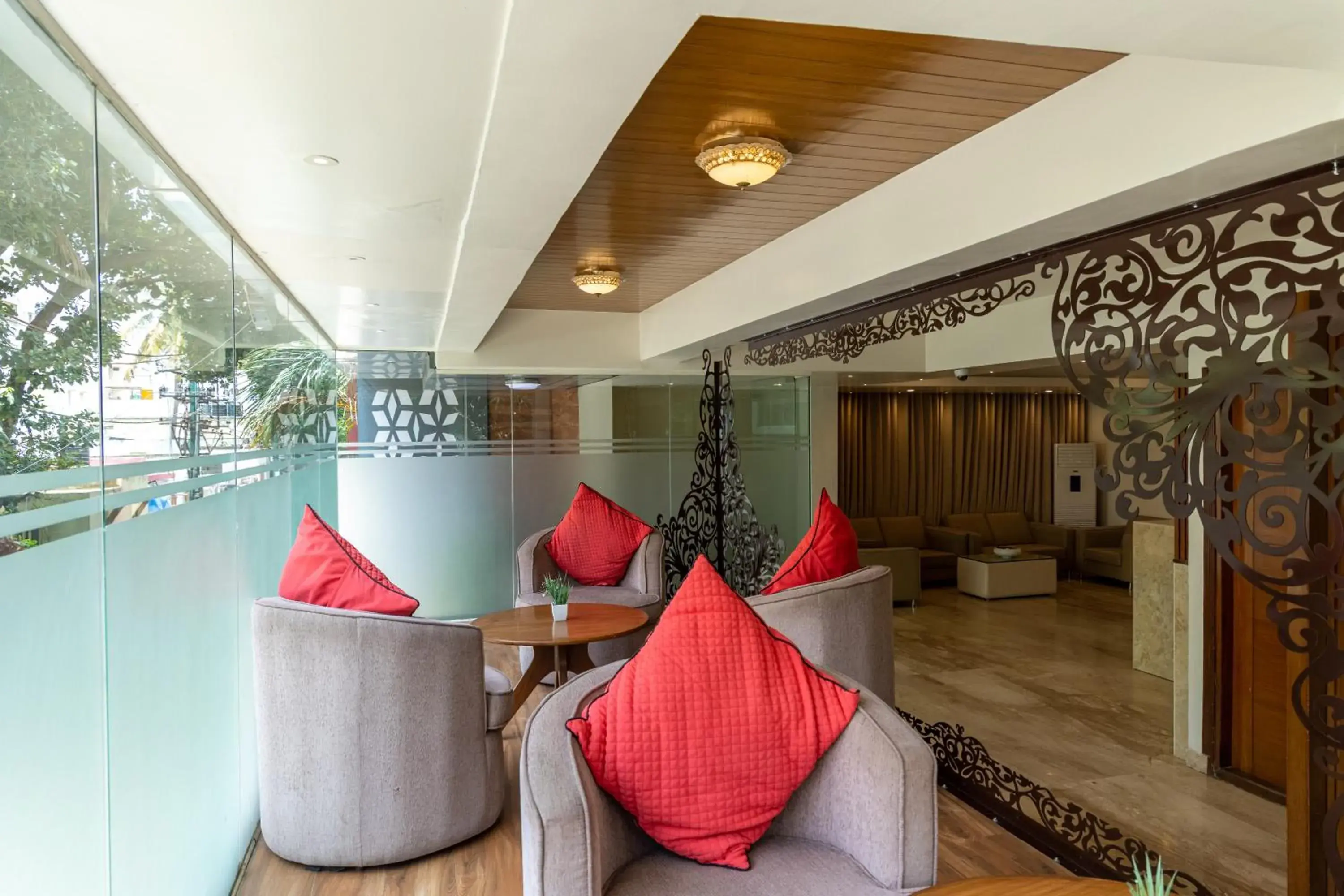 Living room in Tetrad Hotels - International Airport Road Hebbal Living room in Tetrad Hotels - International Airport Road Hebbal