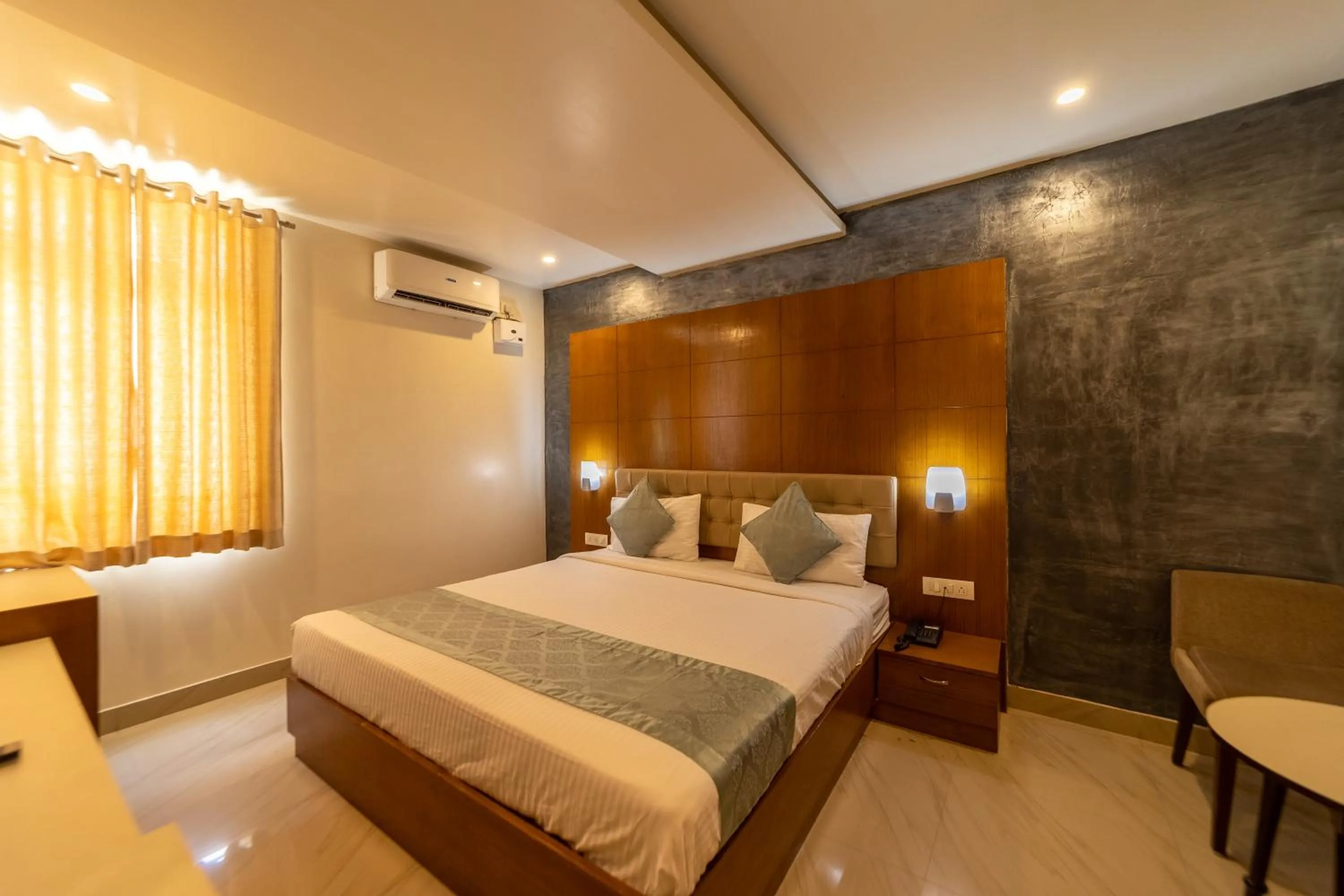Bedroom, Bed in Tetrad Hotels - International Airport Road Hebbal