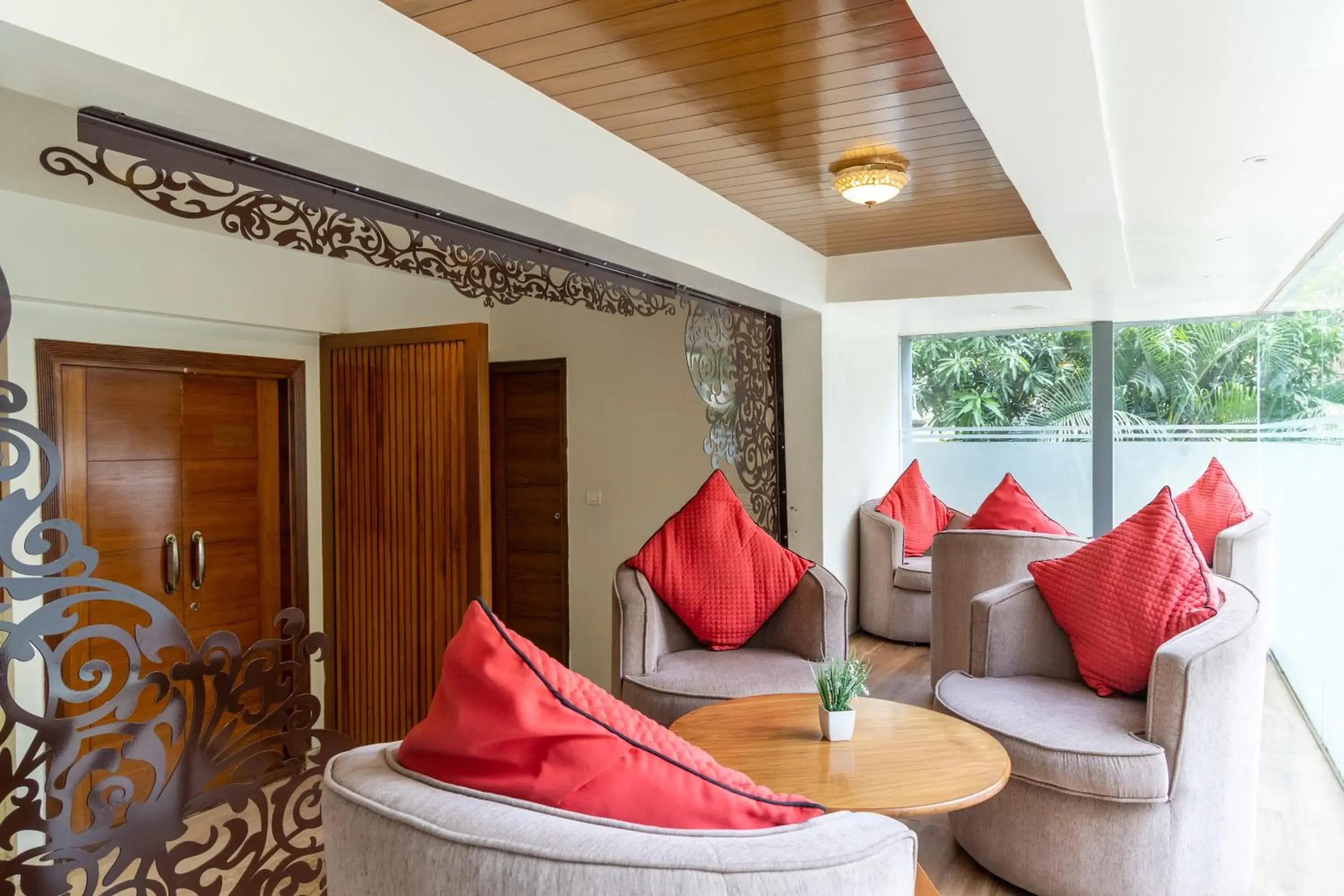 Living room in Tetrad Hotels - International Airport Road Hebbal Living room in Tetrad Hotels - International Airport Road Hebbal