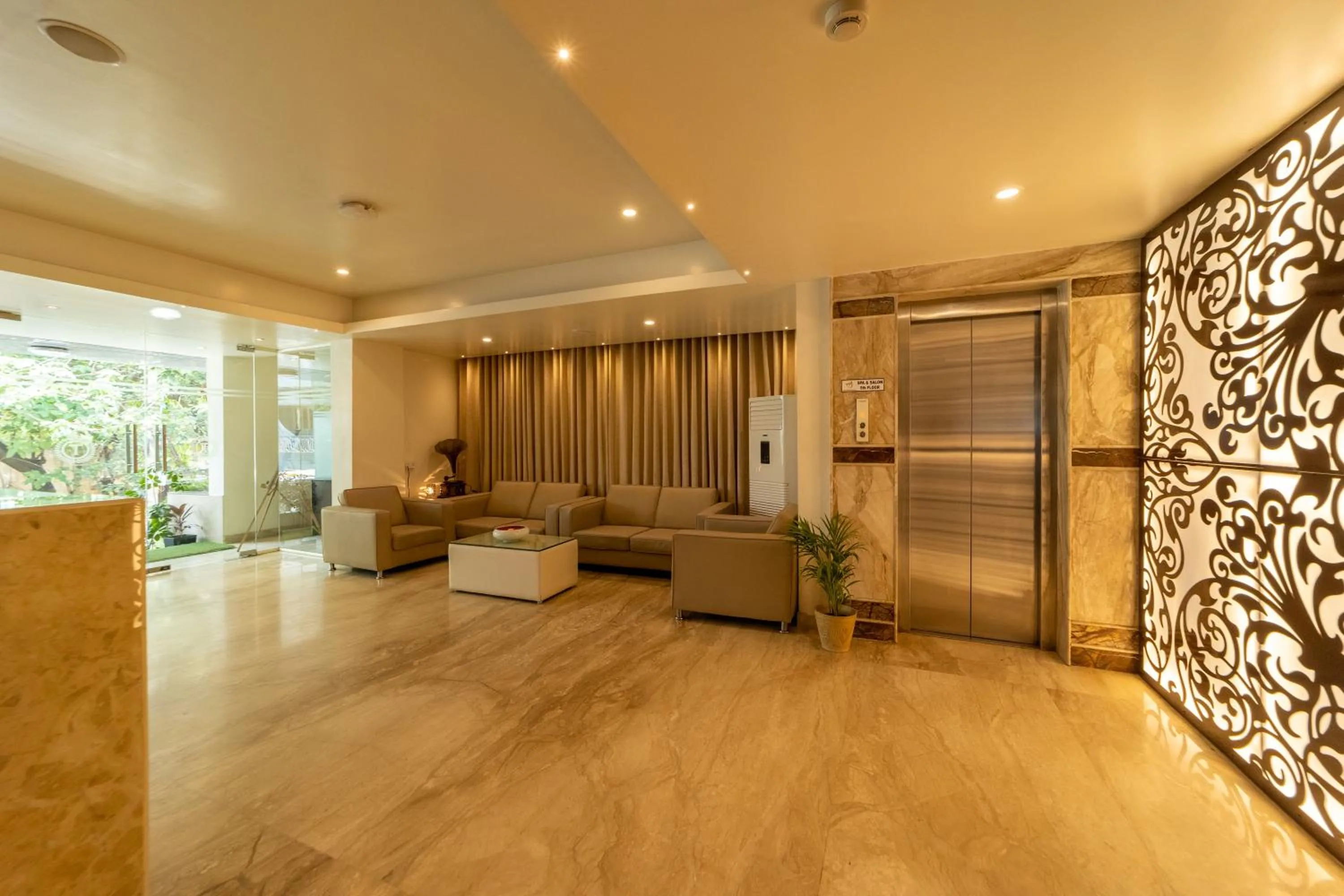 Seating area in Tetrad Hotels - International Airport Road Hebbal