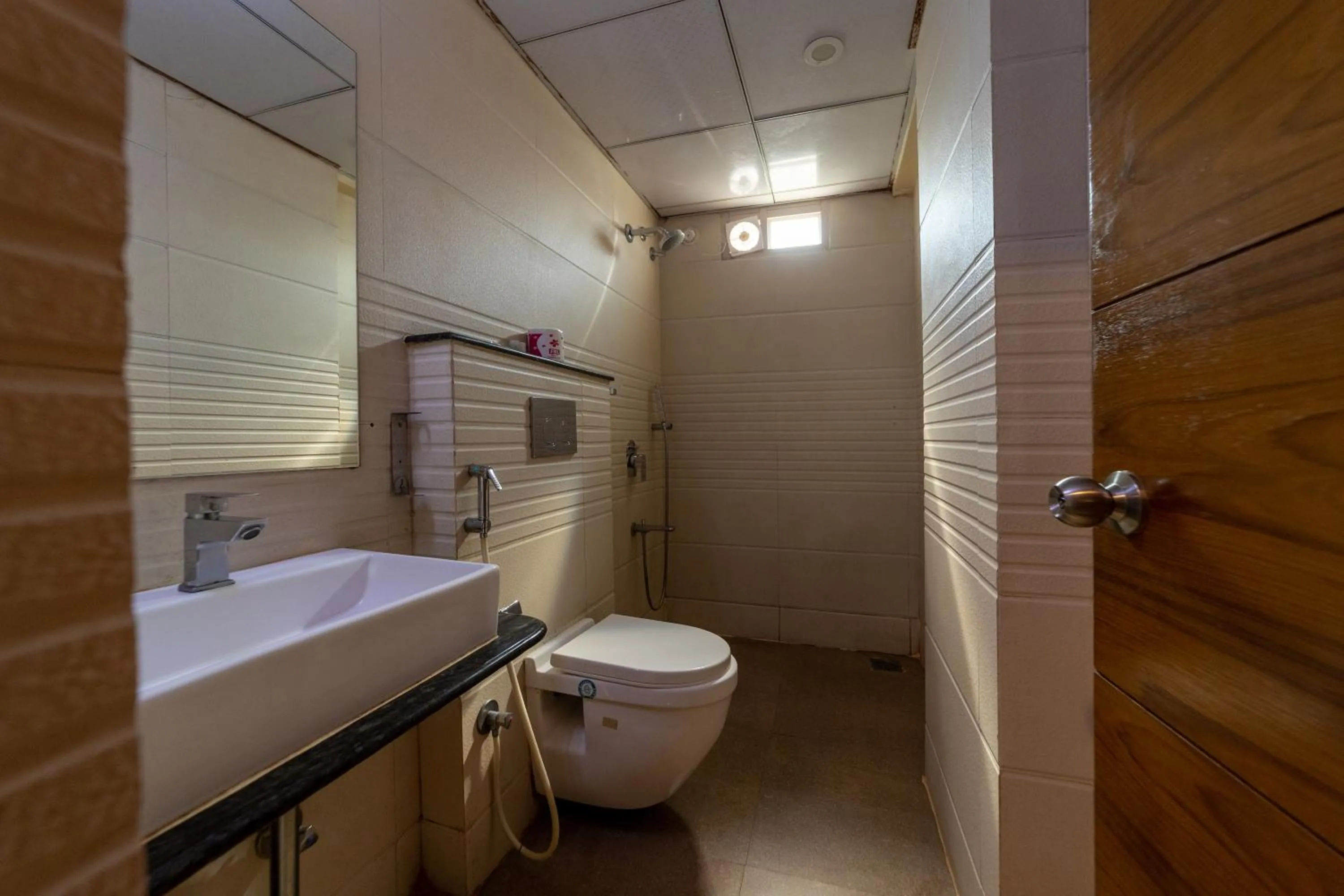 Bathroom in Tetrad Hotels - International Airport Road Hebbal