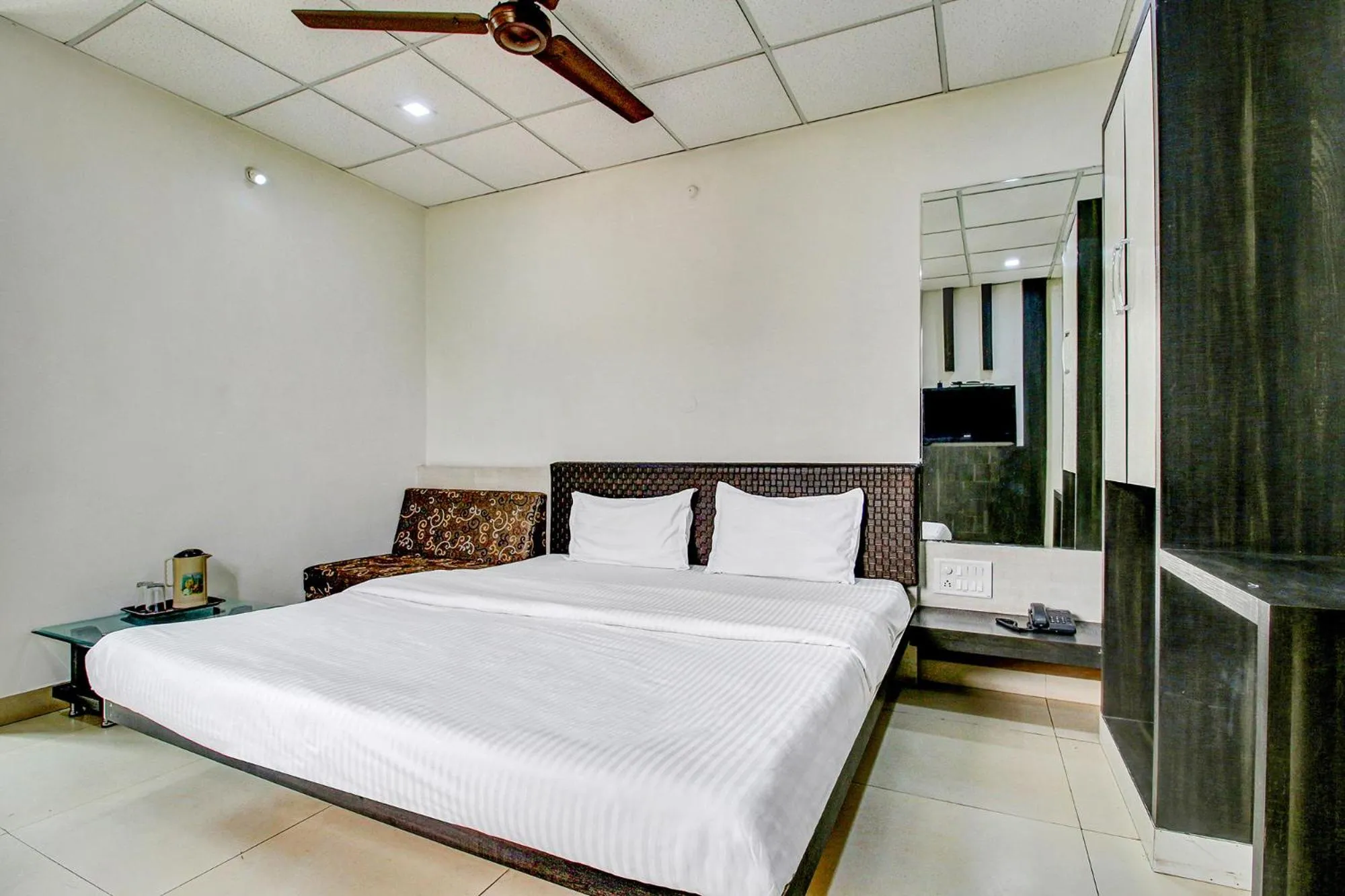 Bed in FabHotel Prime Manjeet