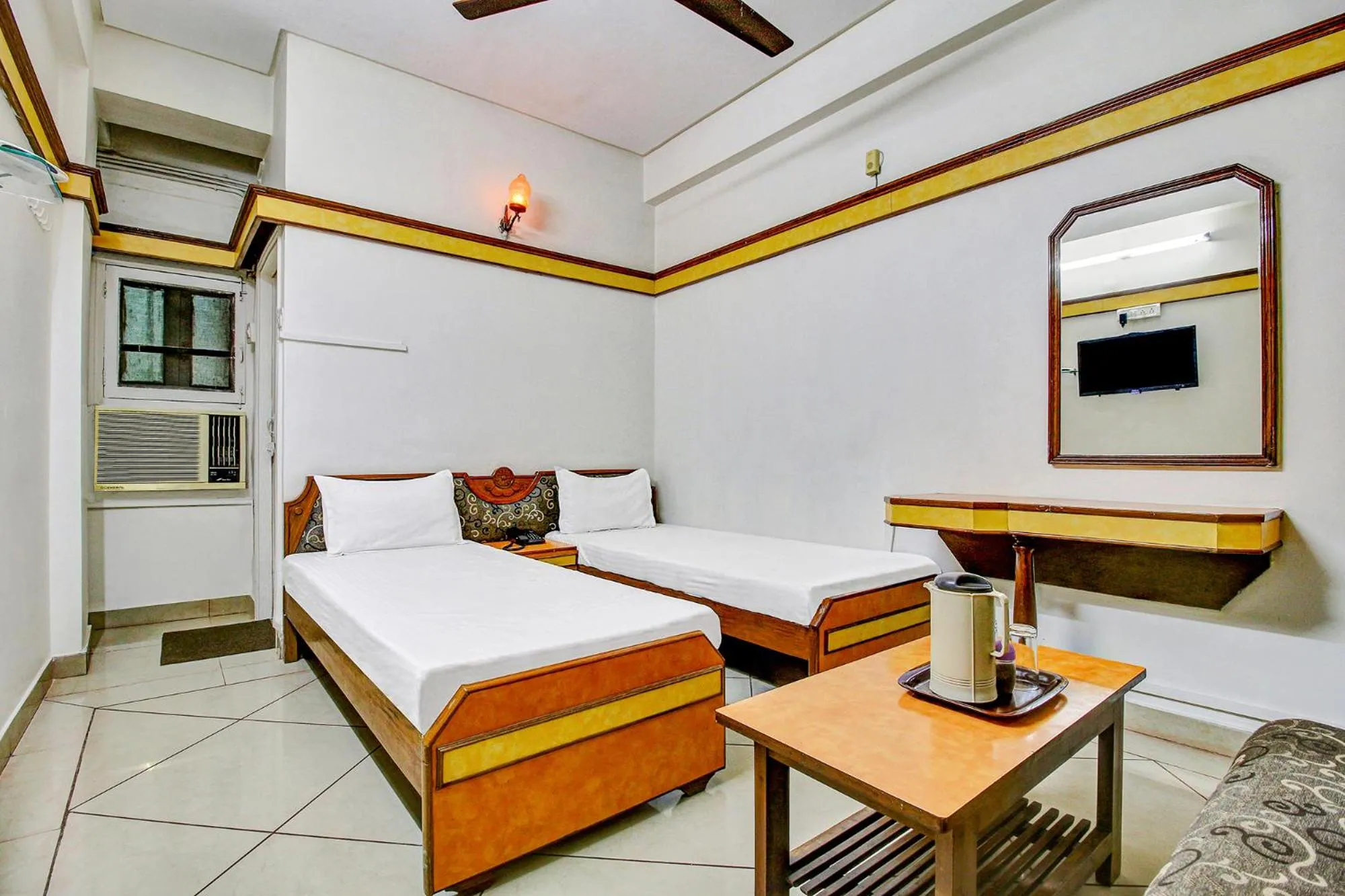 Bed in FabHotel Prime Manjeet