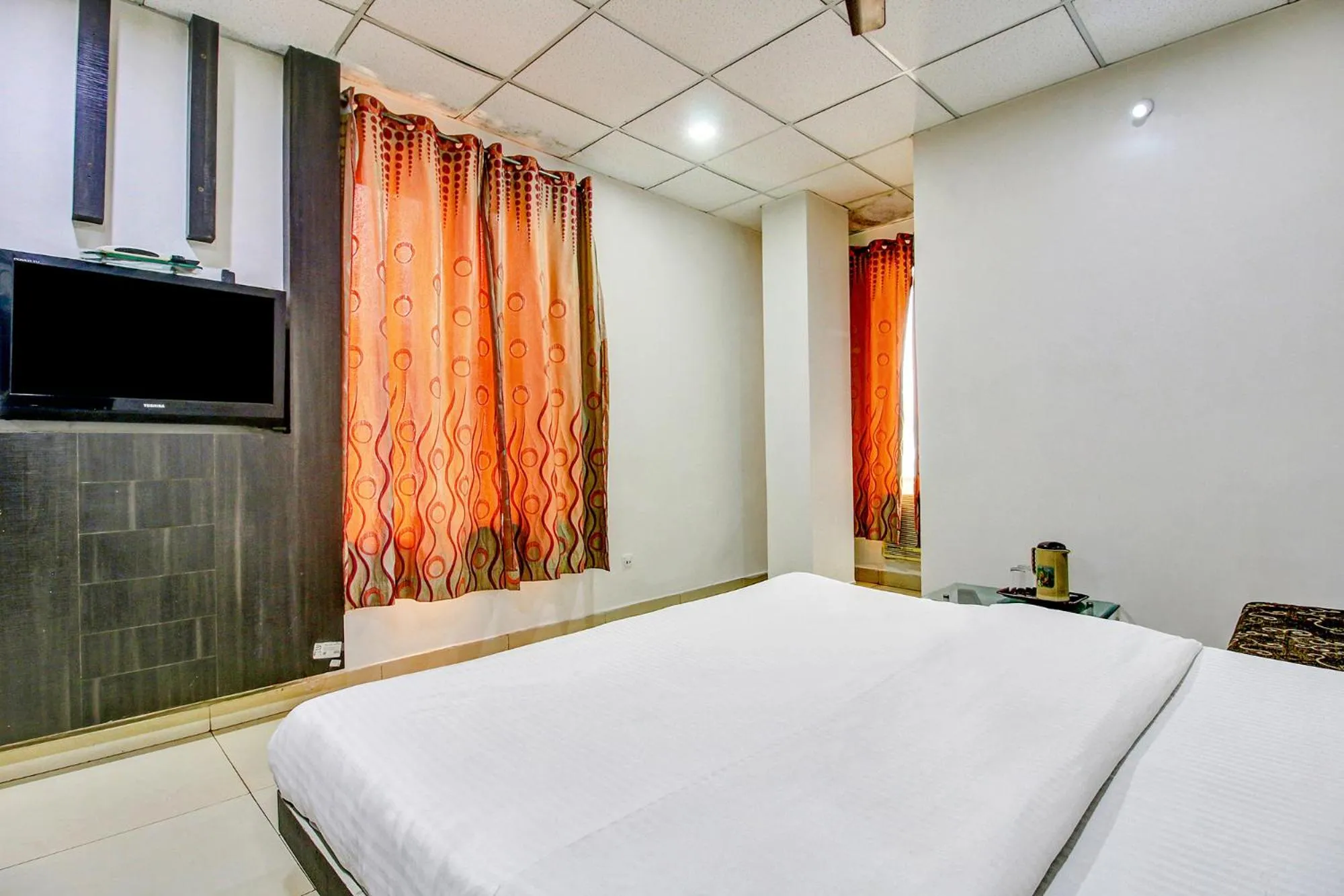 Bed in FabHotel Prime Manjeet