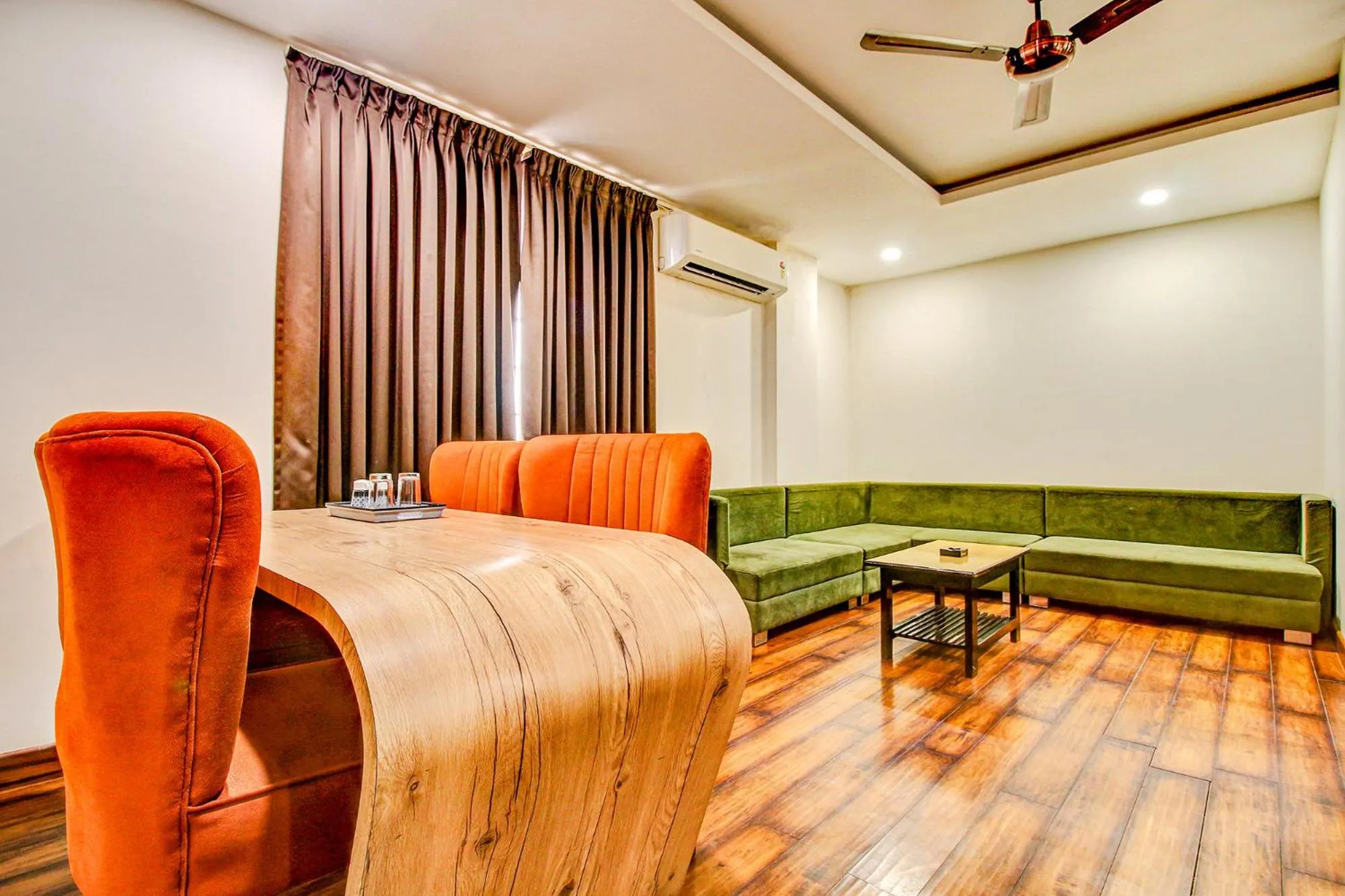 Seating area, Bed in FabHotel Prime Manjeet