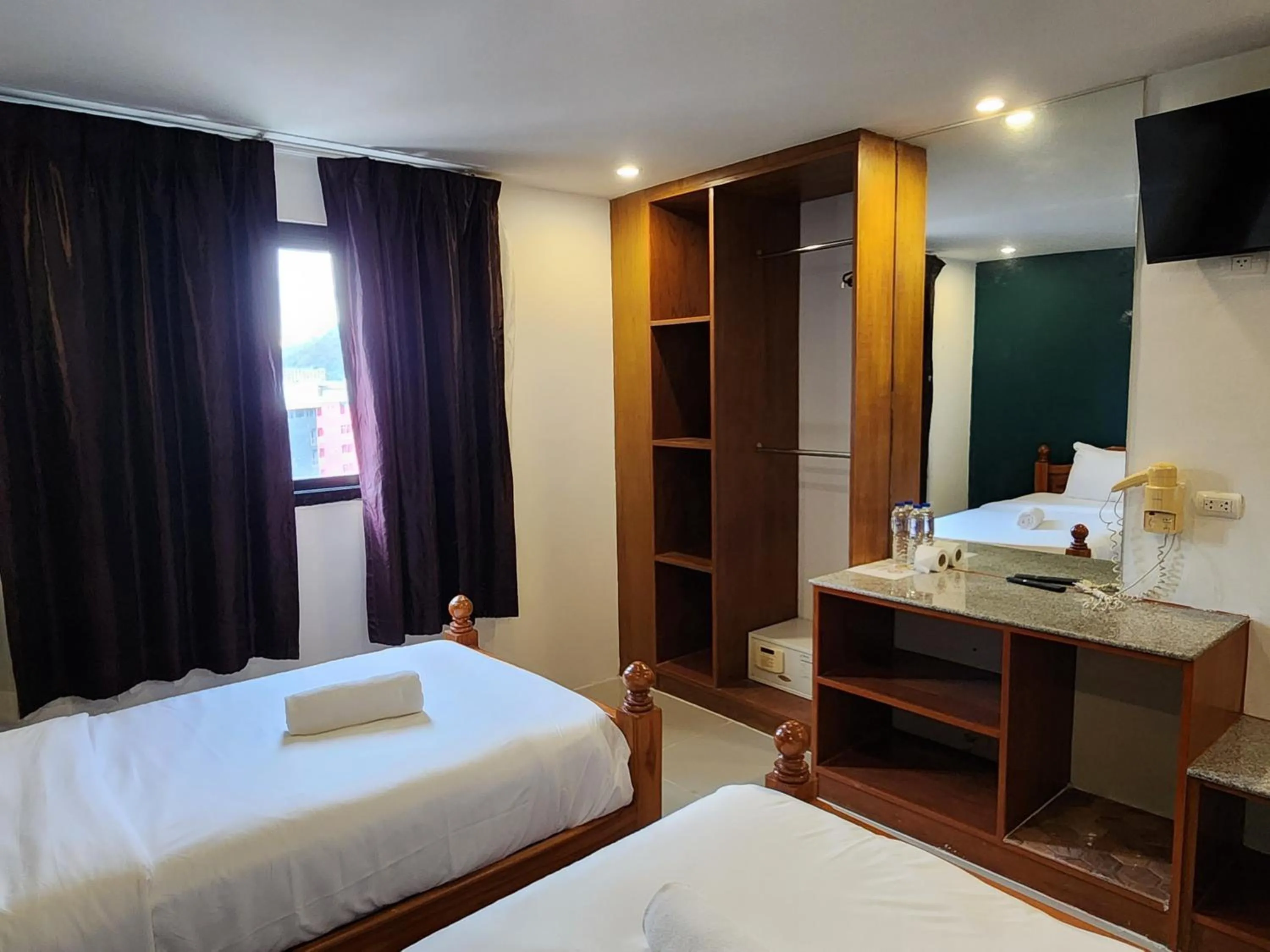 Bed in Patong Dynasty Royal Hotel