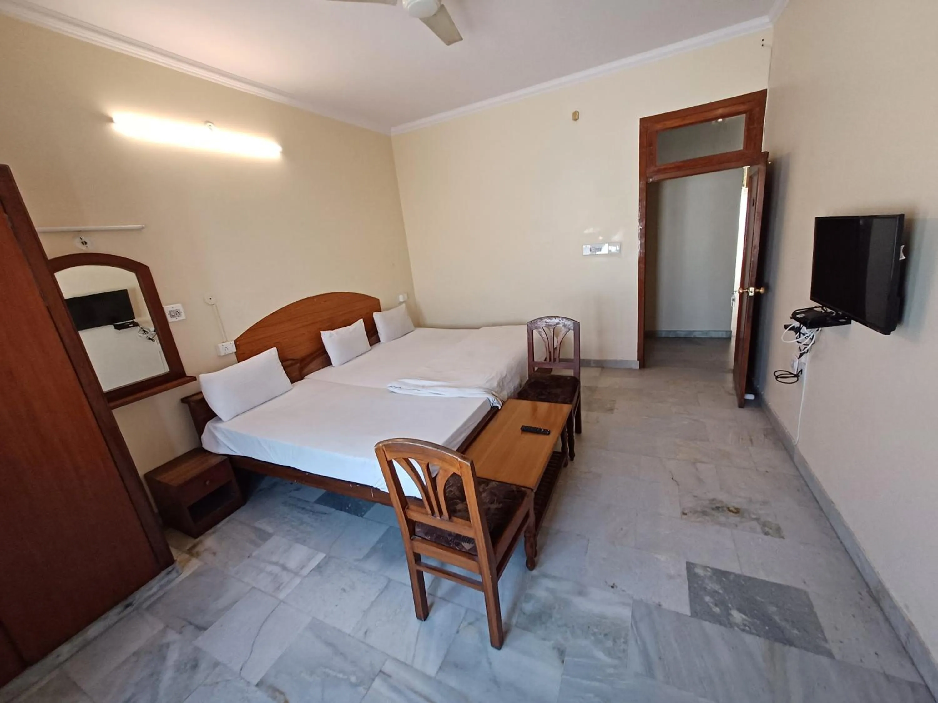 Photo of the whole room, Bed in Hotel Raghav Palace 1 km Jaipur Junction & Bus Stand Sindhi Camp