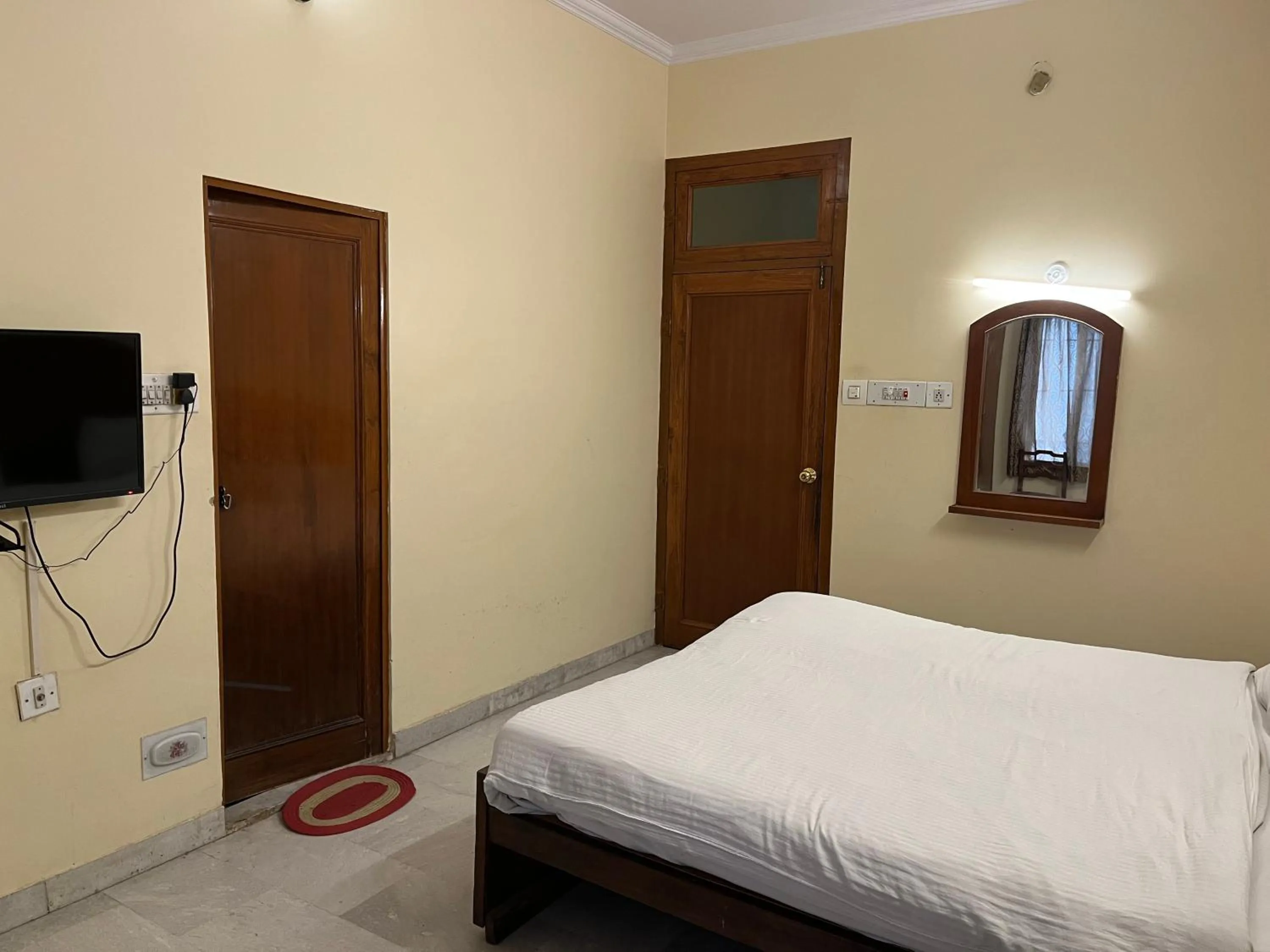 Photo of the whole room, Bed in Hotel Raghav Palace 1 km Jaipur Junction & Bus Stand Sindhi Camp