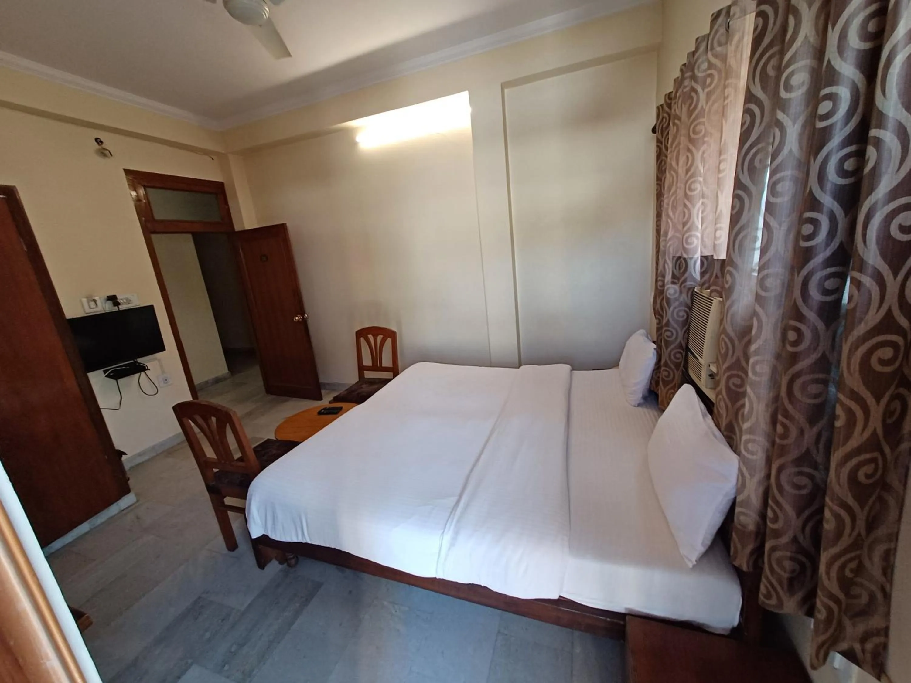 Photo of the whole room, Bed in Hotel Raghav Palace 1 km Jaipur Junction & Bus Stand Sindhi Camp