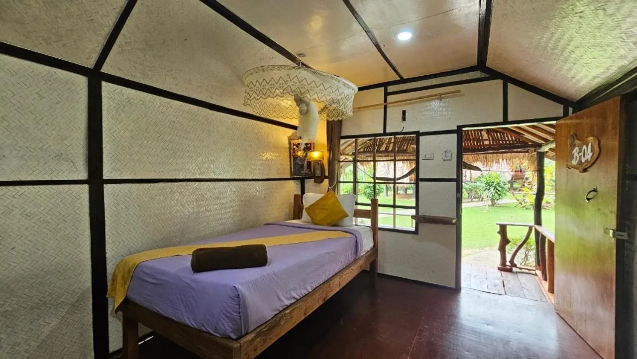 Bed in Eden Lanta Bungalow
