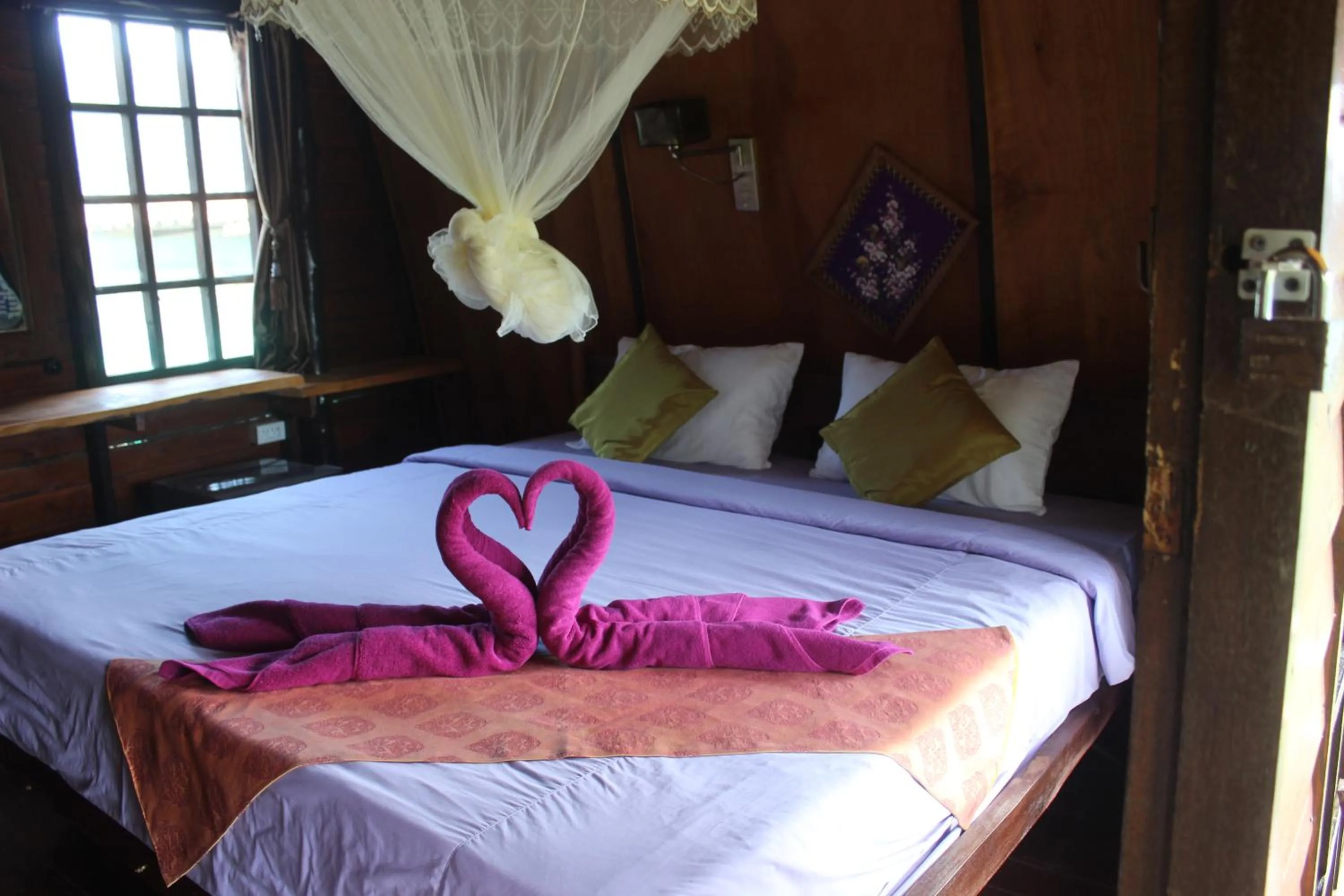 Bed in Eden Lanta Bungalow