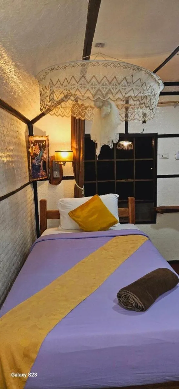 Bed in Eden Lanta Bungalow
