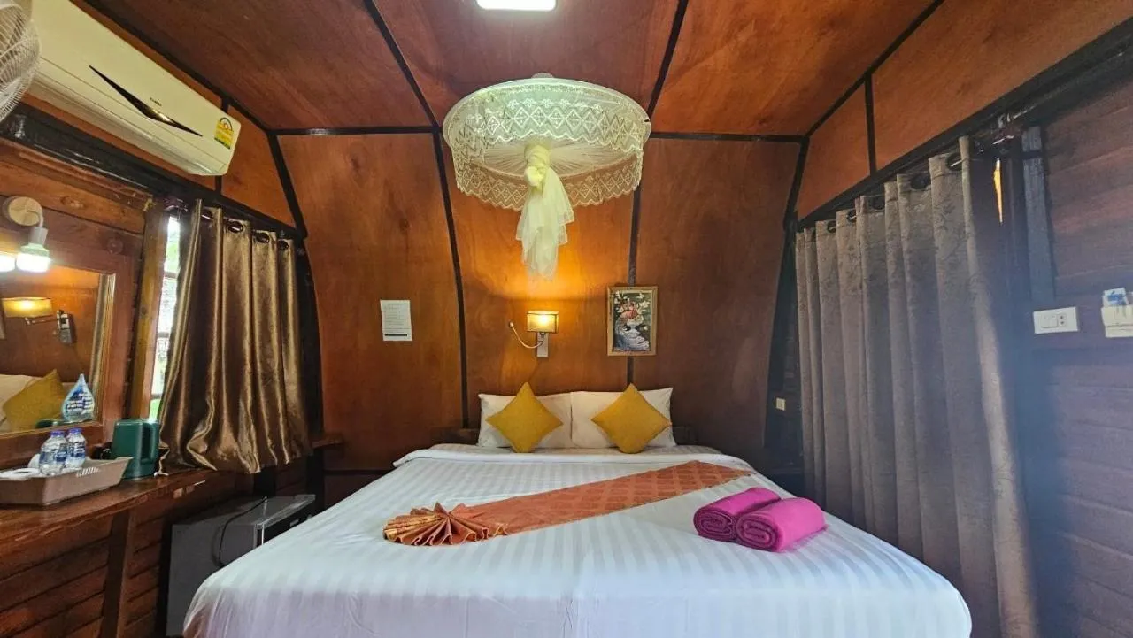 Bed in Eden Lanta Bungalow