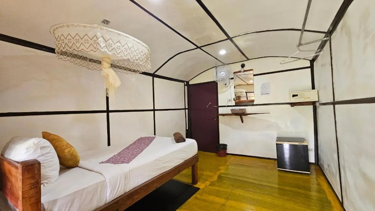 Bed in Eden Lanta Bungalow