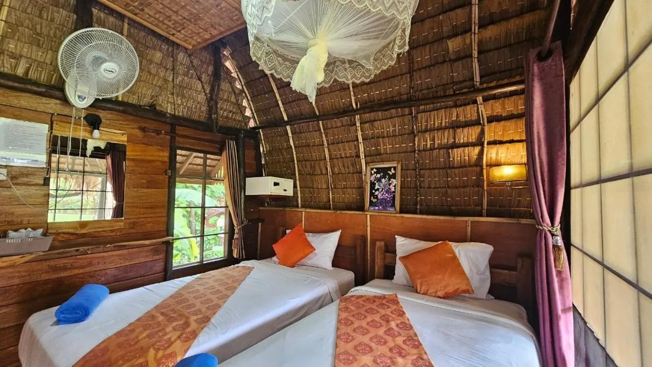 Bed in Eden Lanta Bungalow
