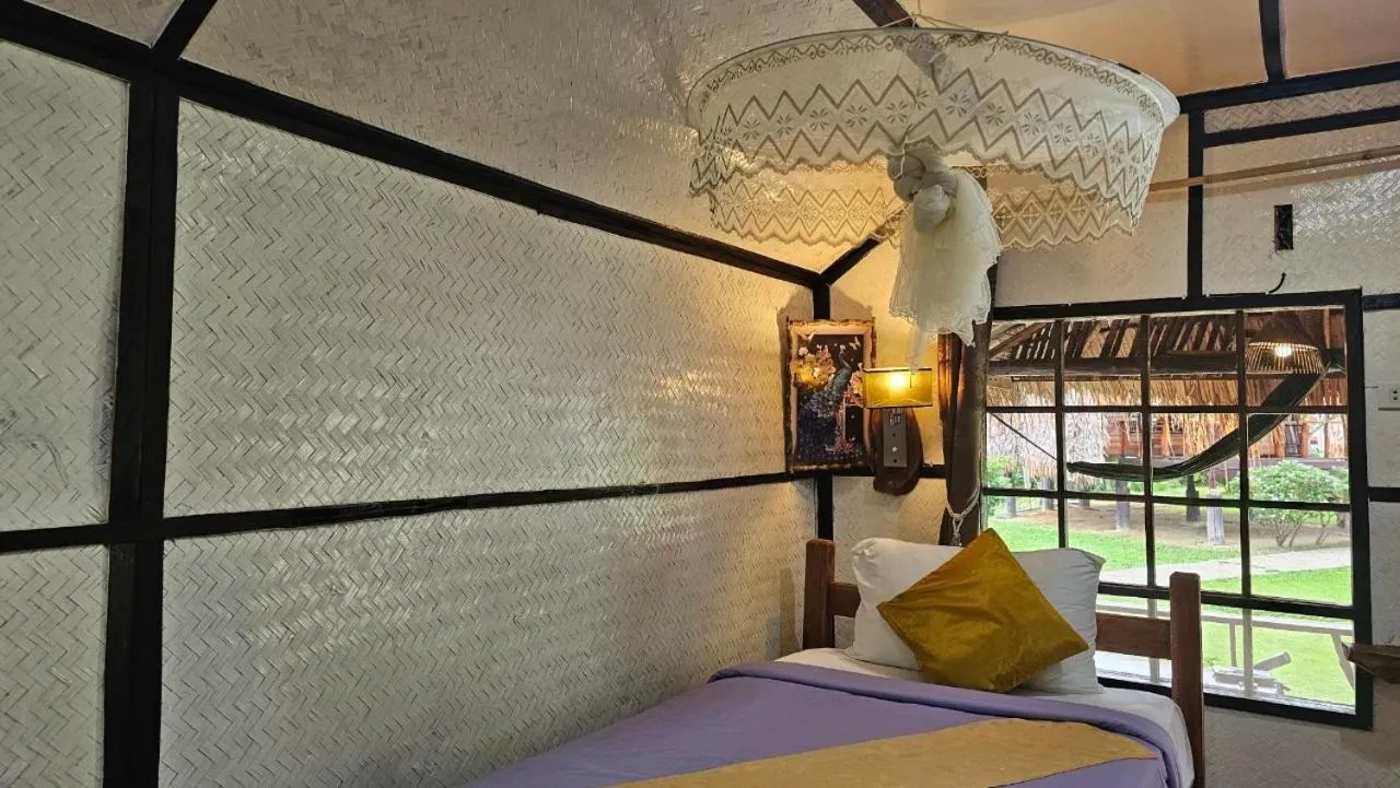 Bed in Eden Lanta Bungalow