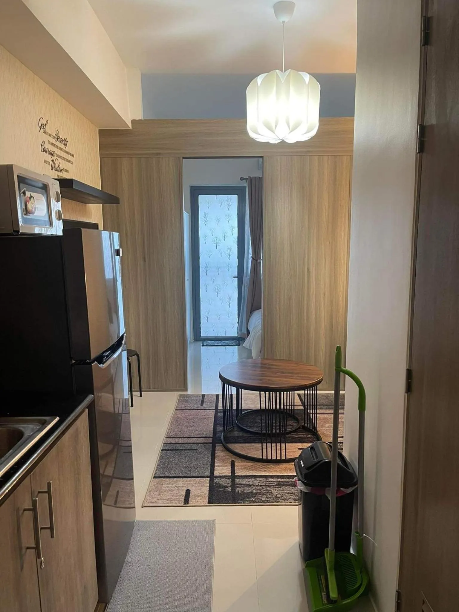 Kitchen or kitchenette in Staycation Mandaluyong Fame residences greenfield district by darpm