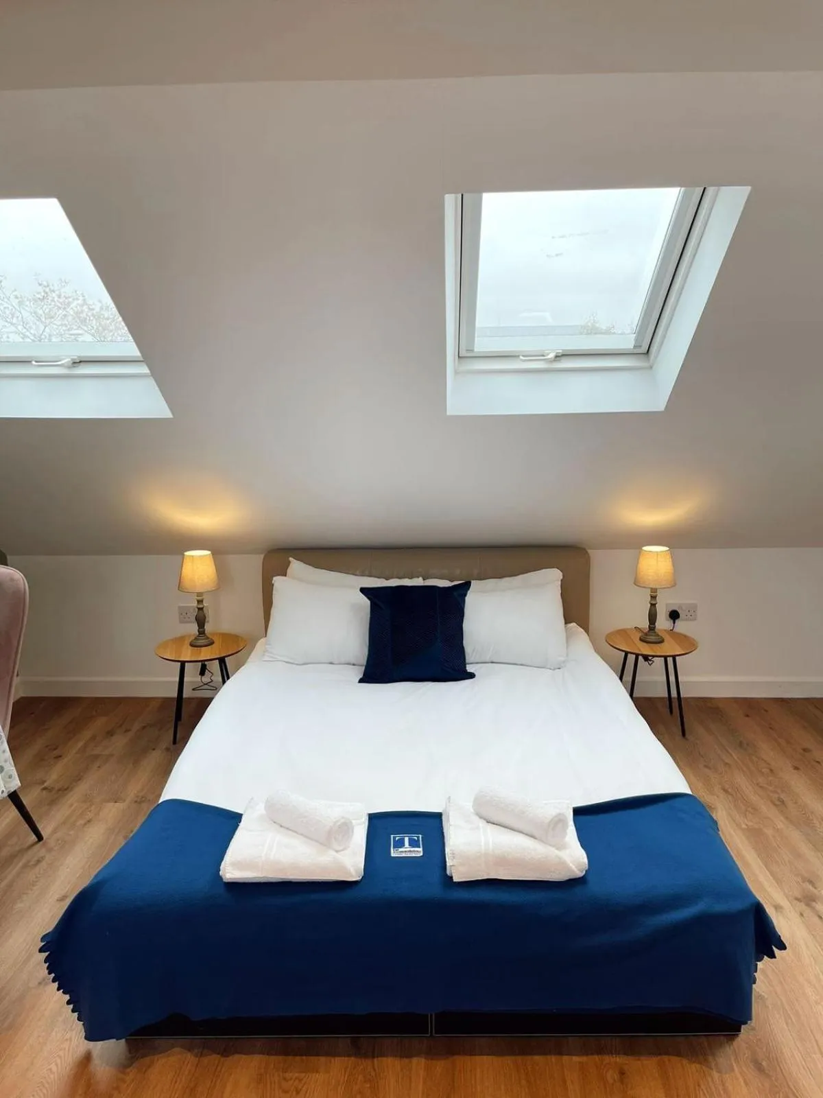 Bed in Cambridge Studios and Suites by Tas Accommodations