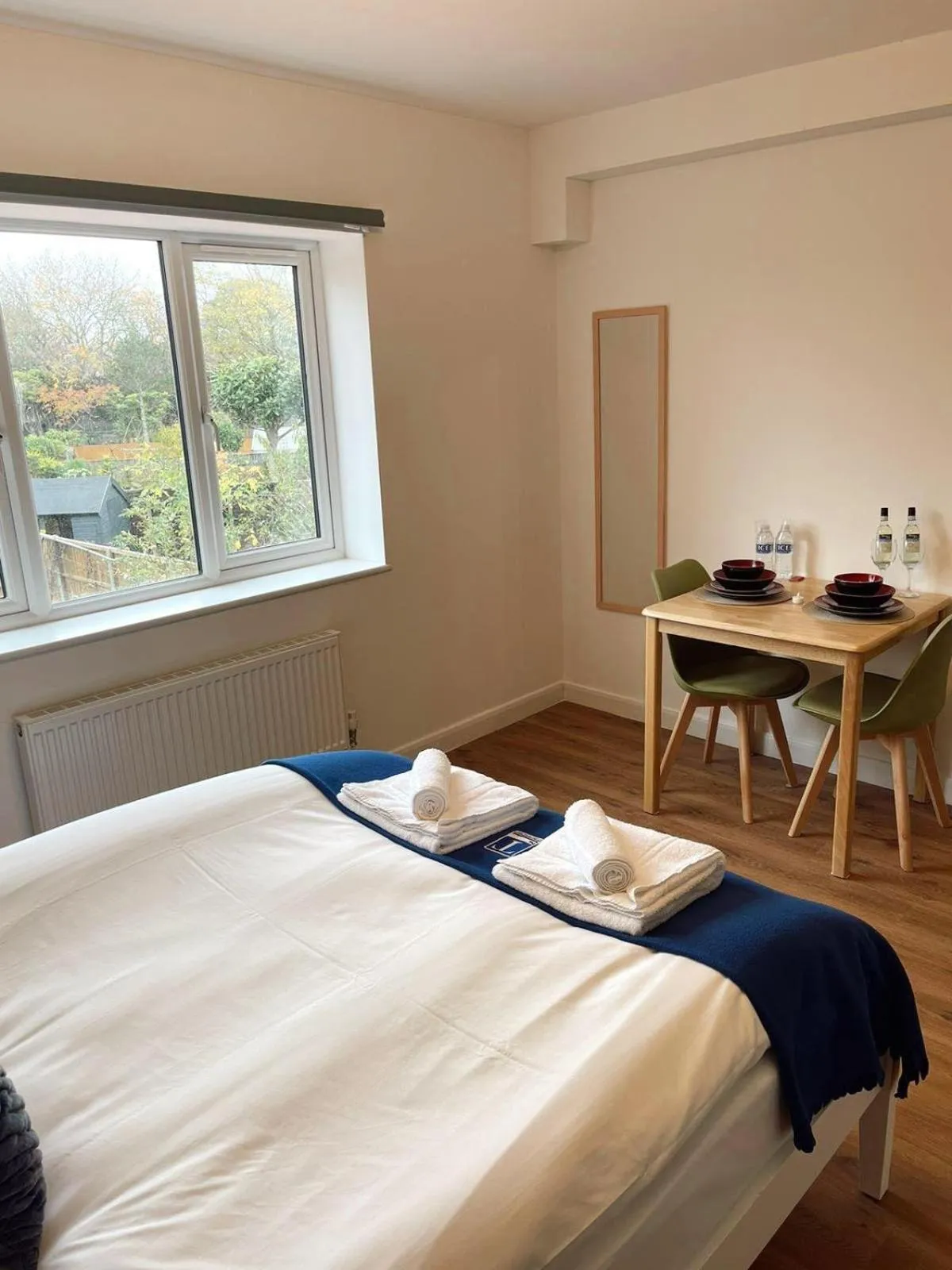 Bed in Cambridge Studios and Suites by Tas Accommodations