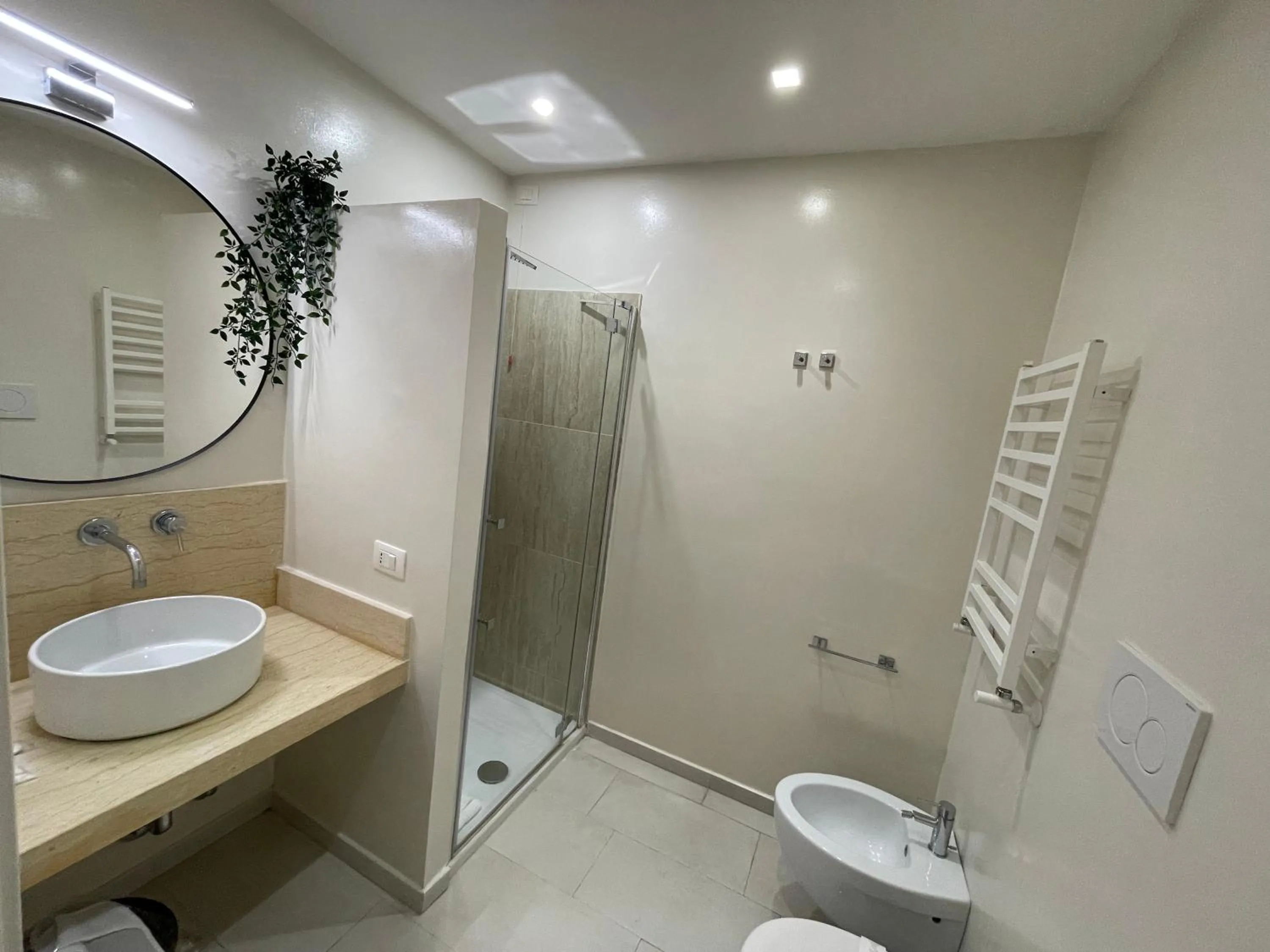 Shower in Quintus Luxury Suites