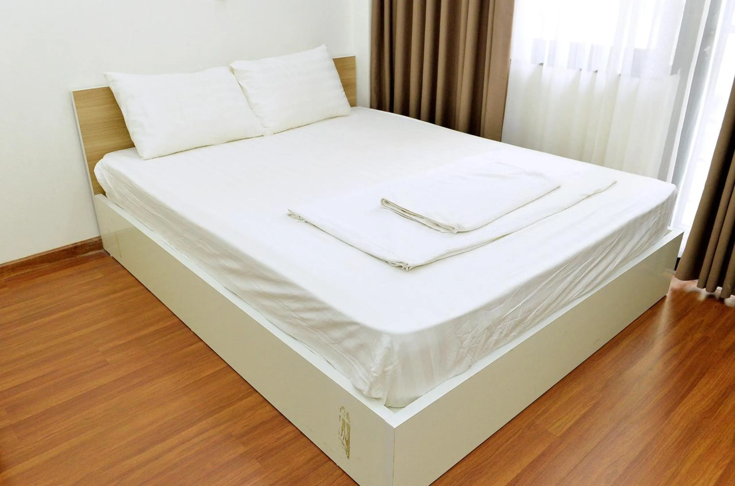 Bed in Era Apartment Đông Các