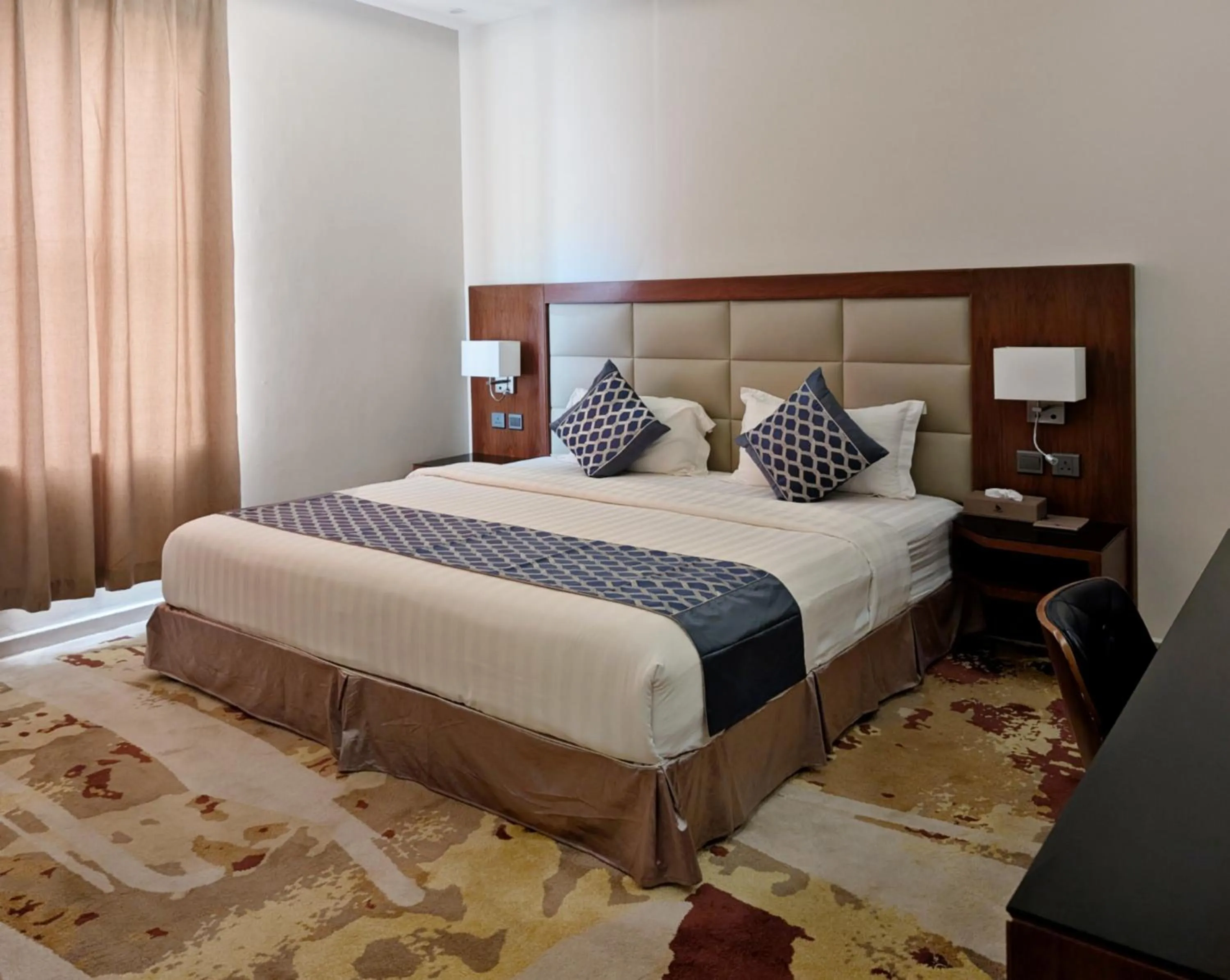 Bed in Delta Hotel Suites