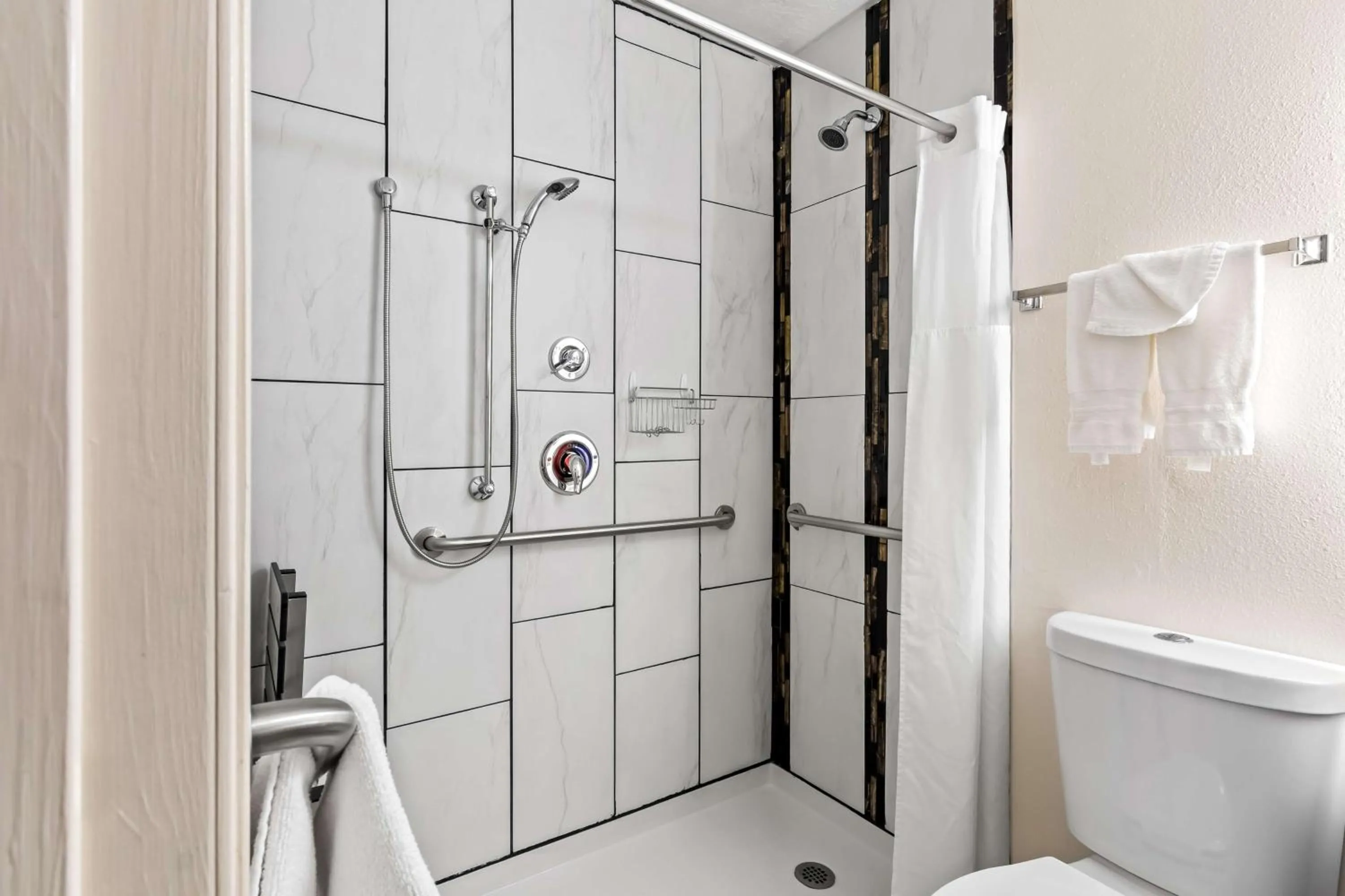 Bathroom in SureStay Hotel by Best Western Duncan