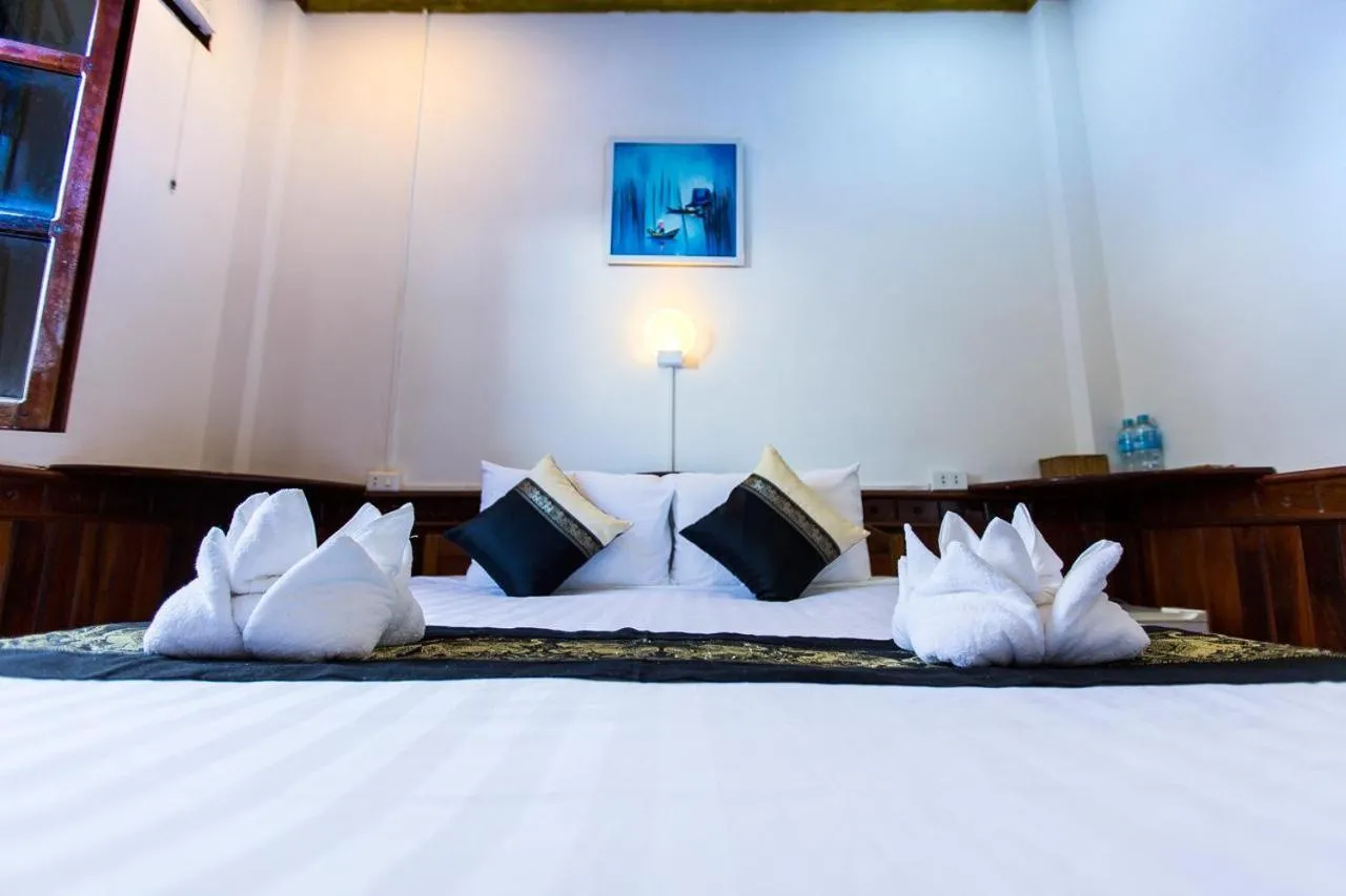 Photo of the whole room, Bed in Moon's house LuangPrabang
