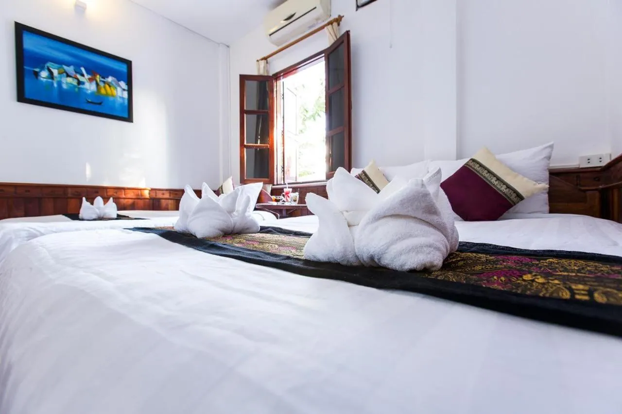 Photo of the whole room, Bed in Moon's house LuangPrabang