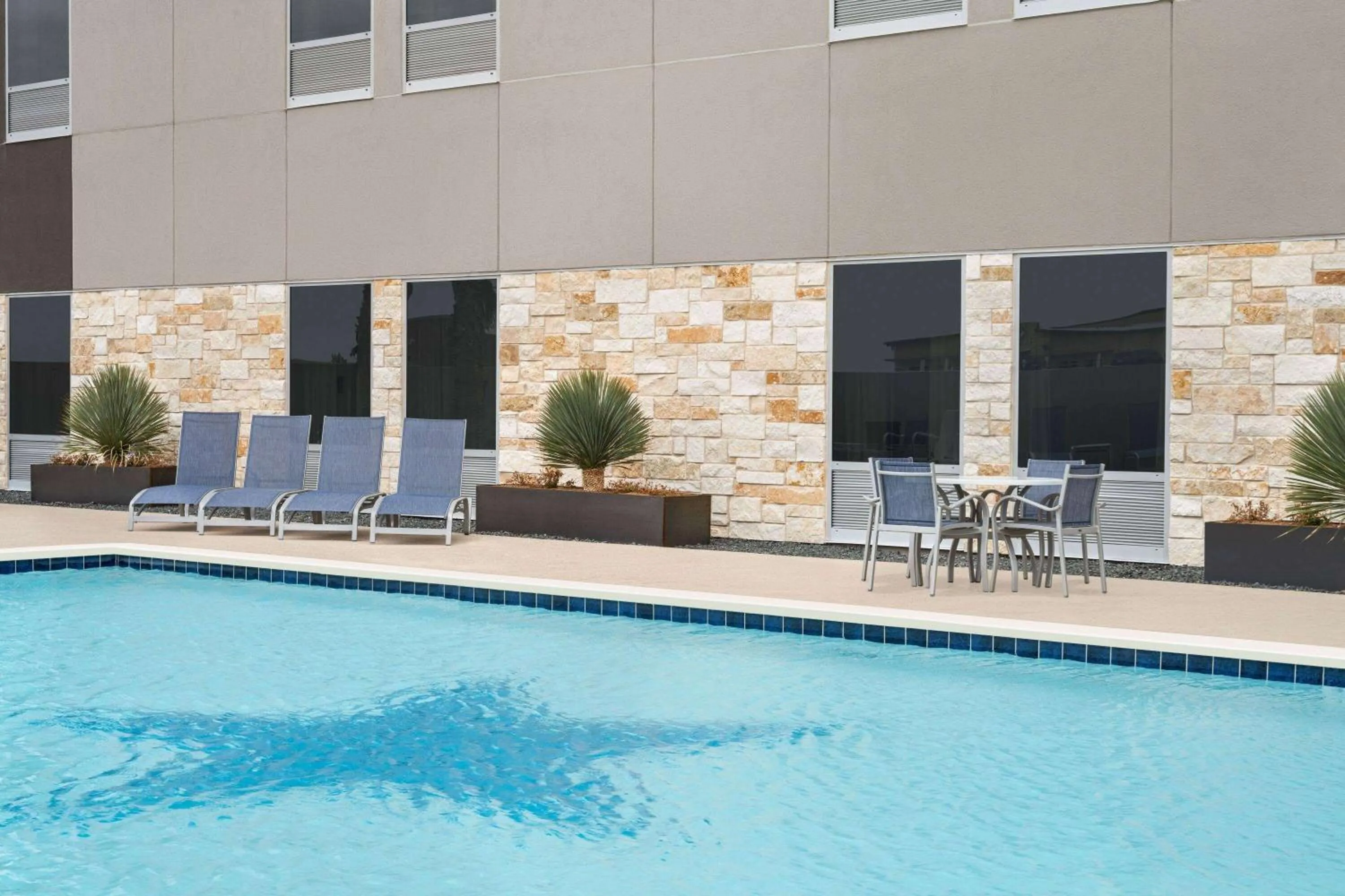 Swimming pool in Hawthorn Extended Stay by Wyndham Del Rio