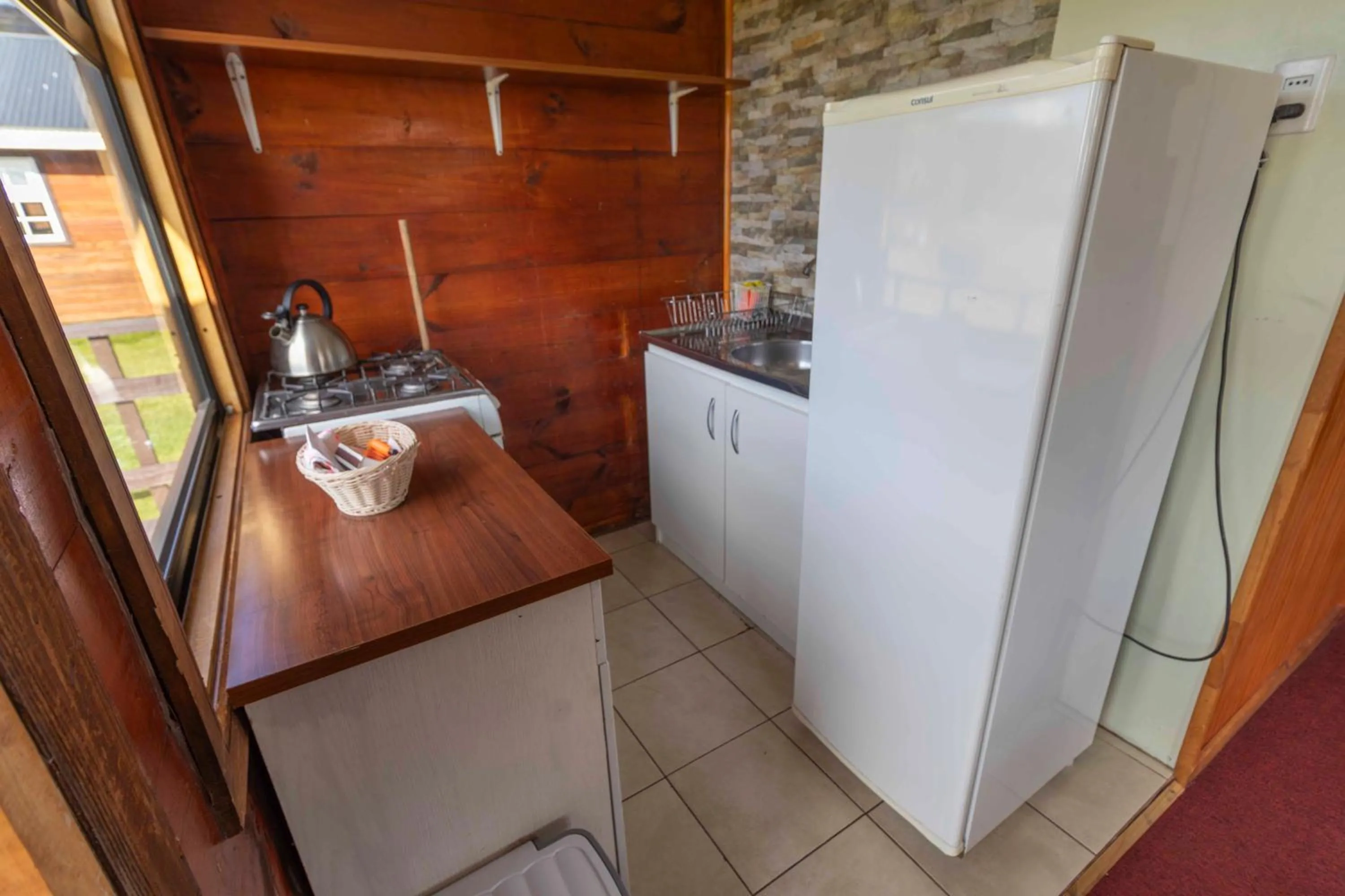 Kitchen or kitchenette in Cabañas Lago Tyndall