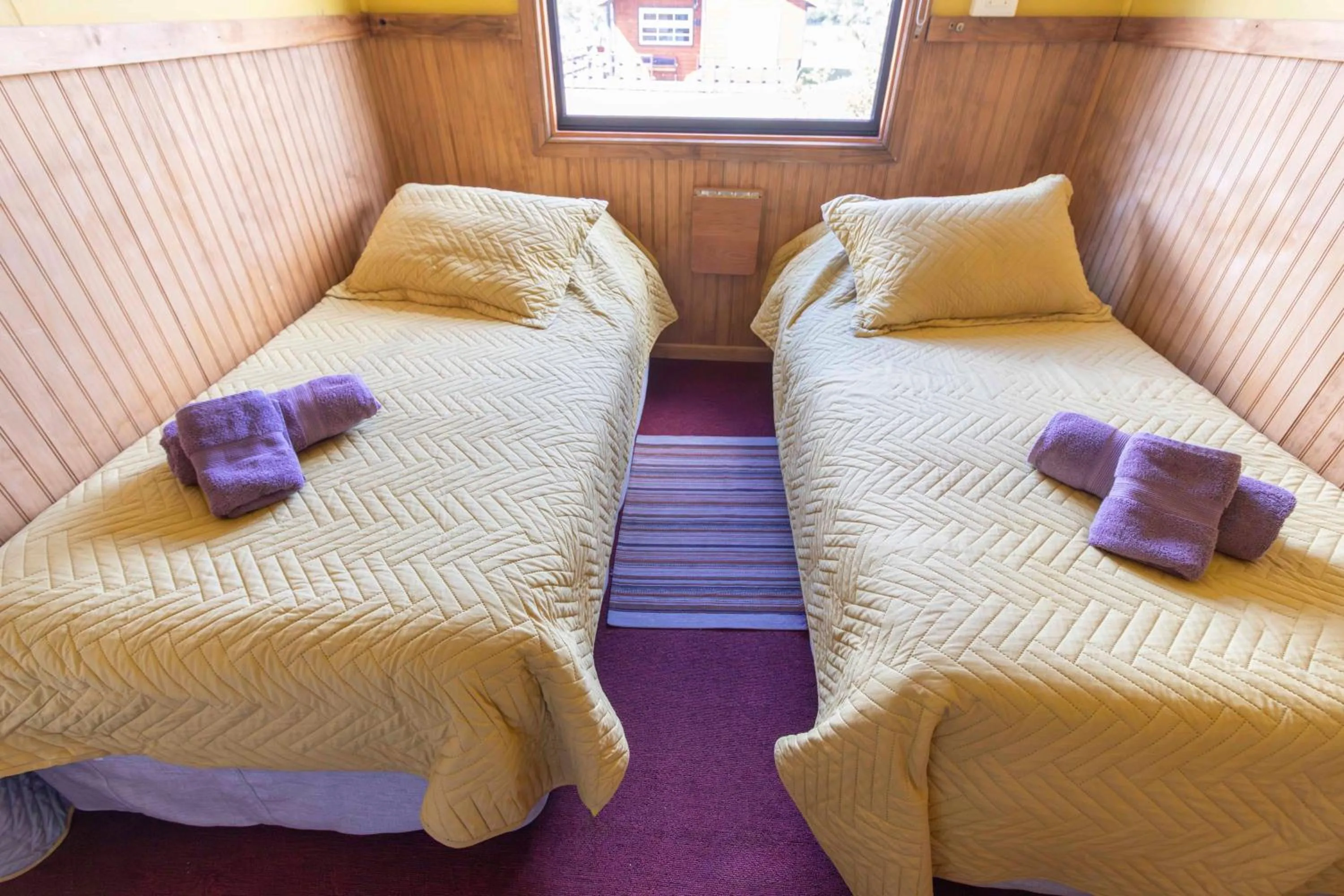 Bed in Cabañas Lago Tyndall