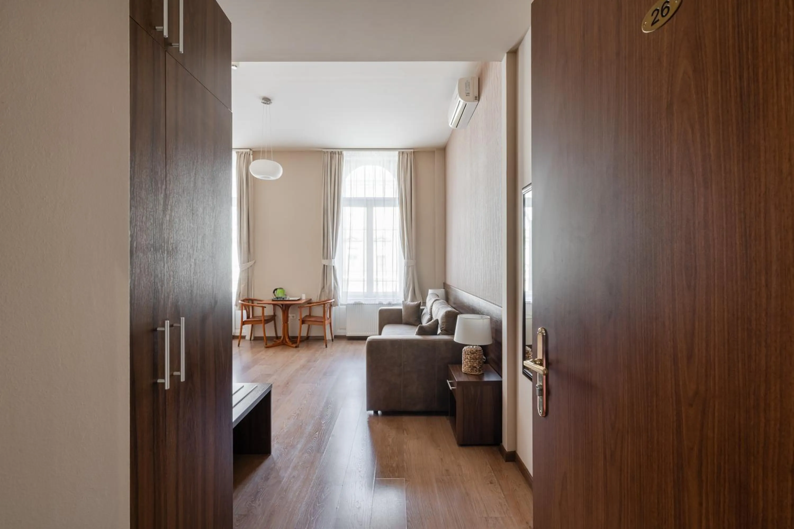 Living room in Elit Boutique Rooms- Best Location by BQA