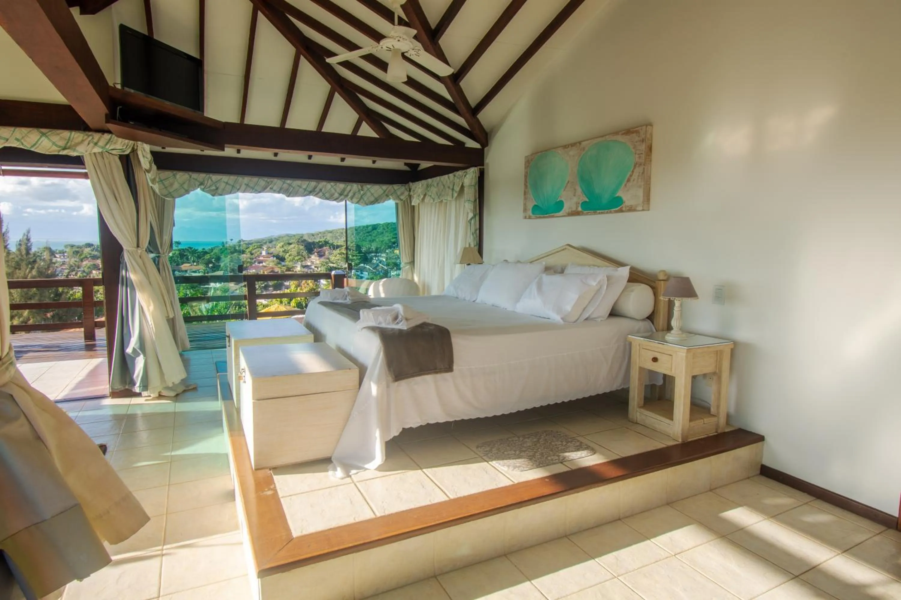 Bed, Seating Area in Pousada Bella Geriba Buzios