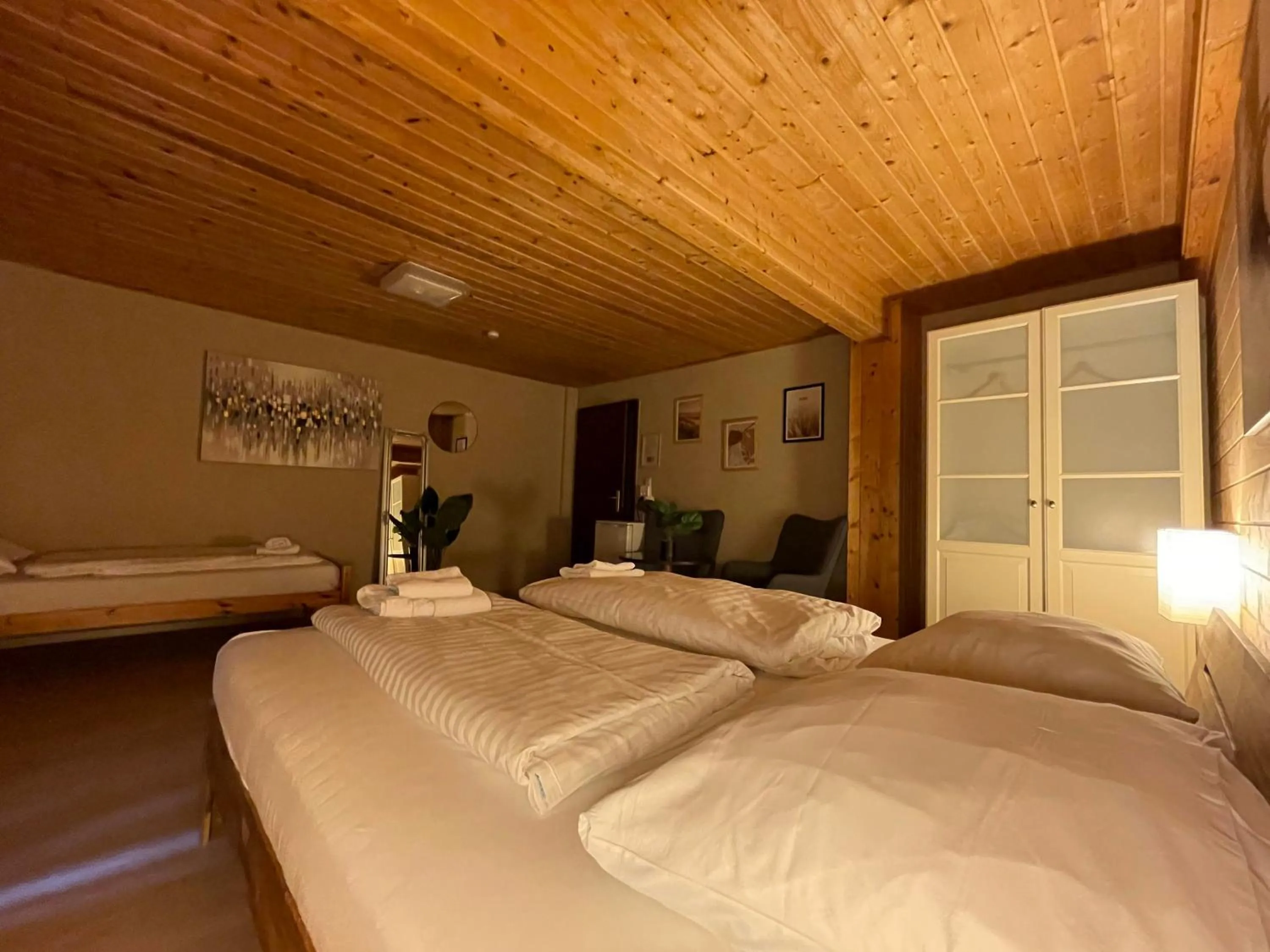 Bed in The Art and Sporthotel