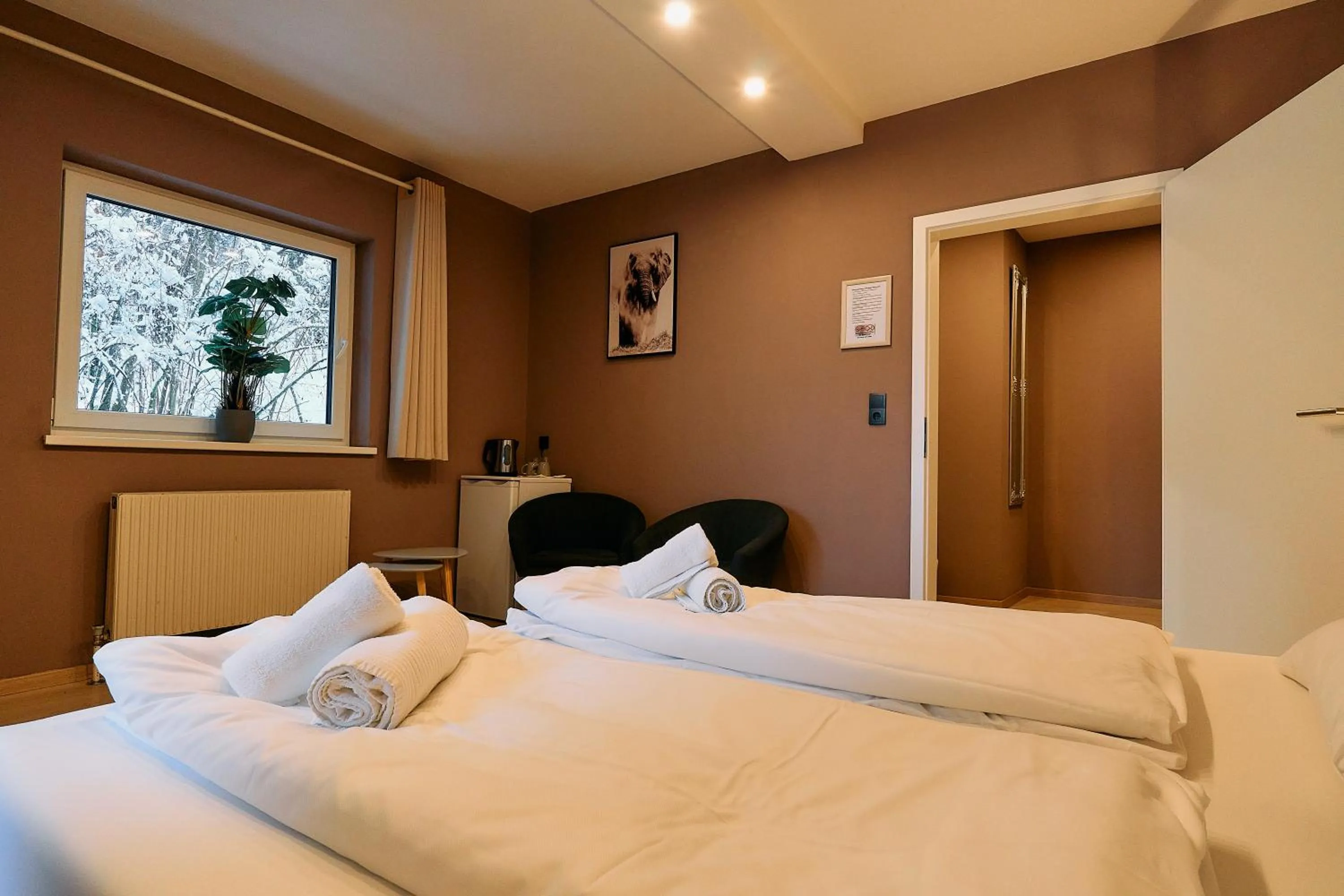 Bed in The Art and Sporthotel