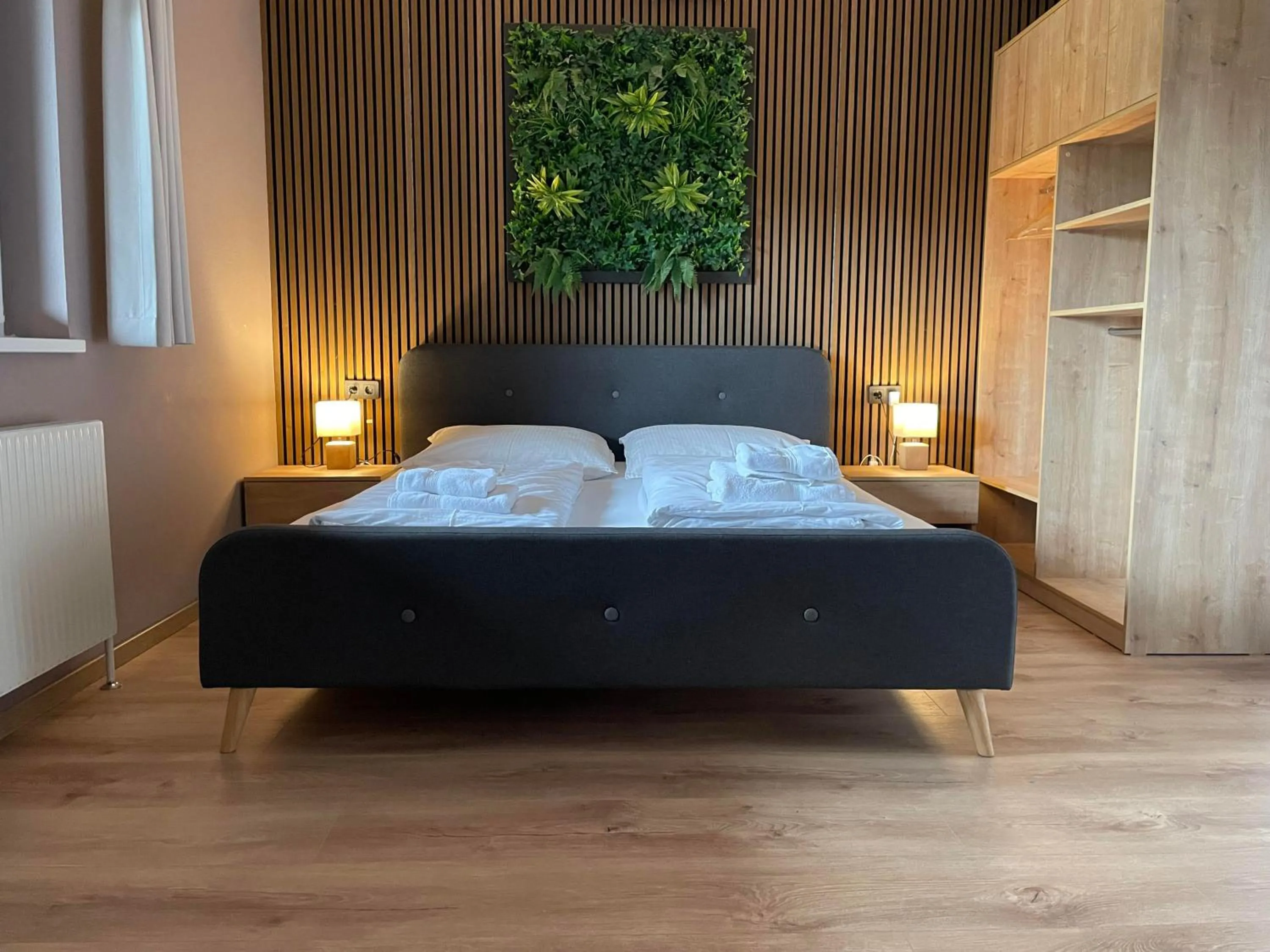 Bed in The Art and Sporthotel