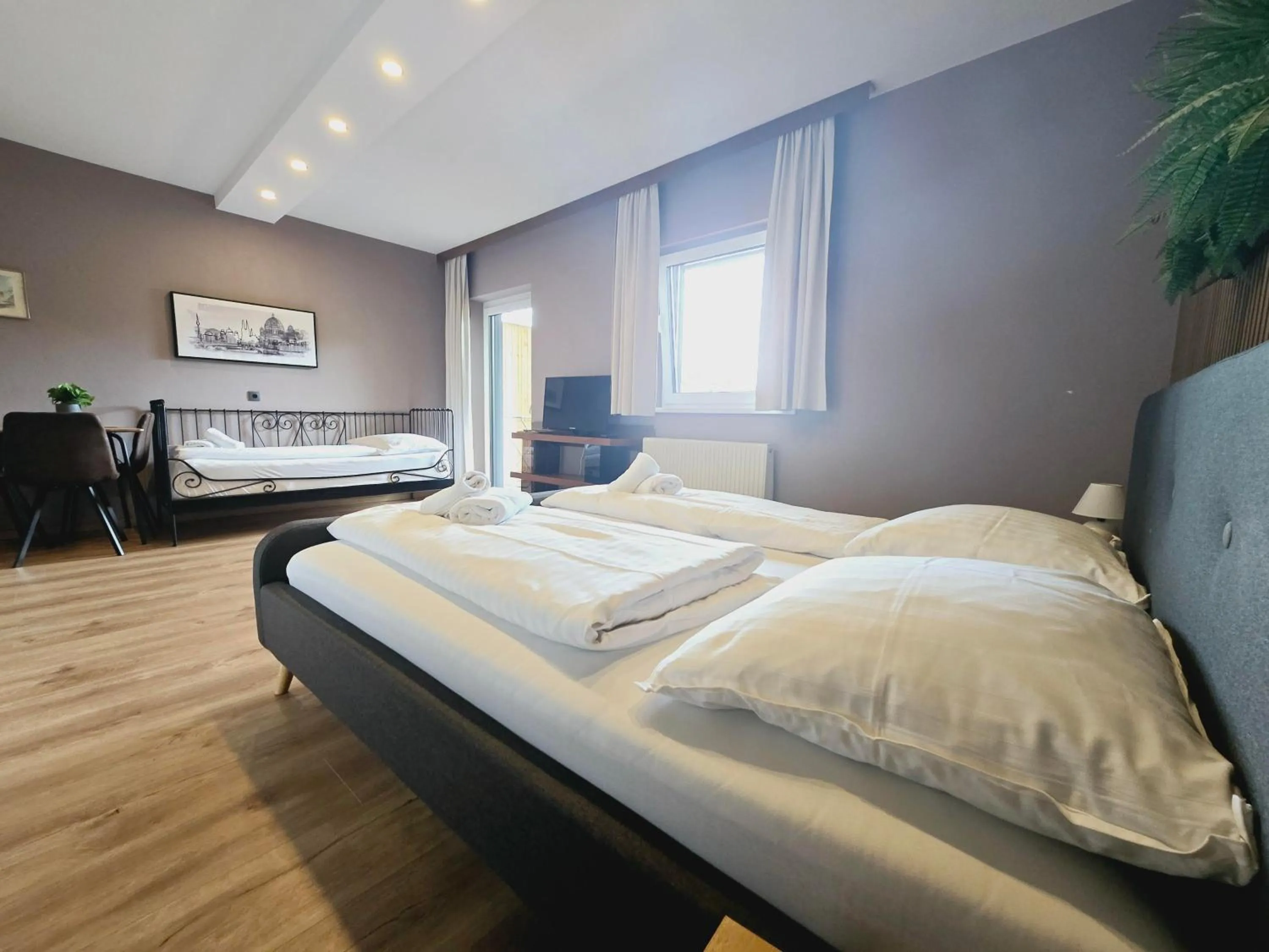 Bed in The Art and Sporthotel