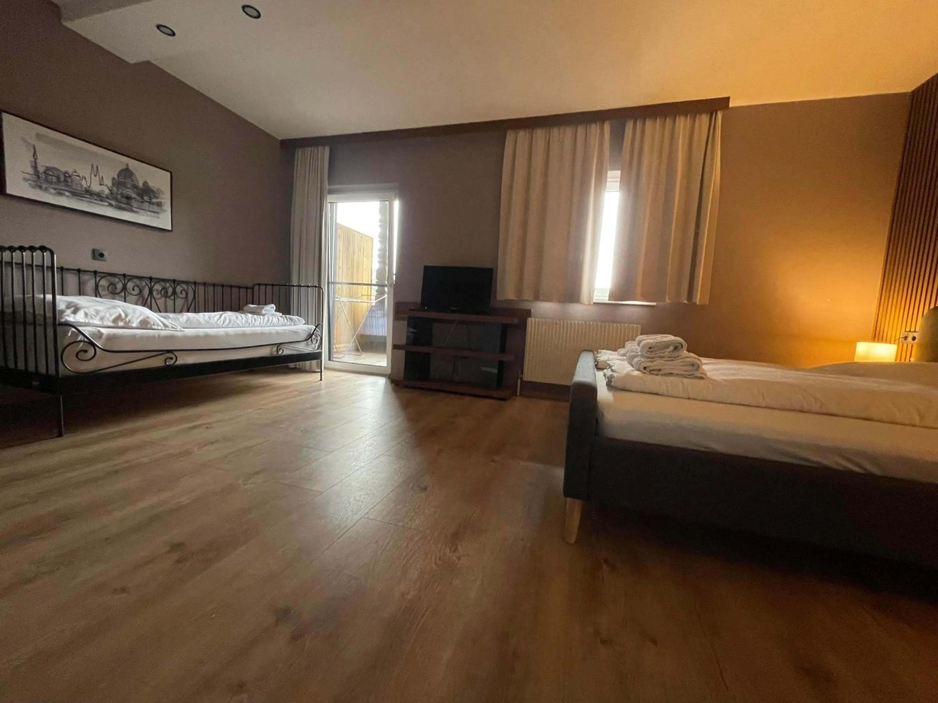 Bed in The Art and Sporthotel