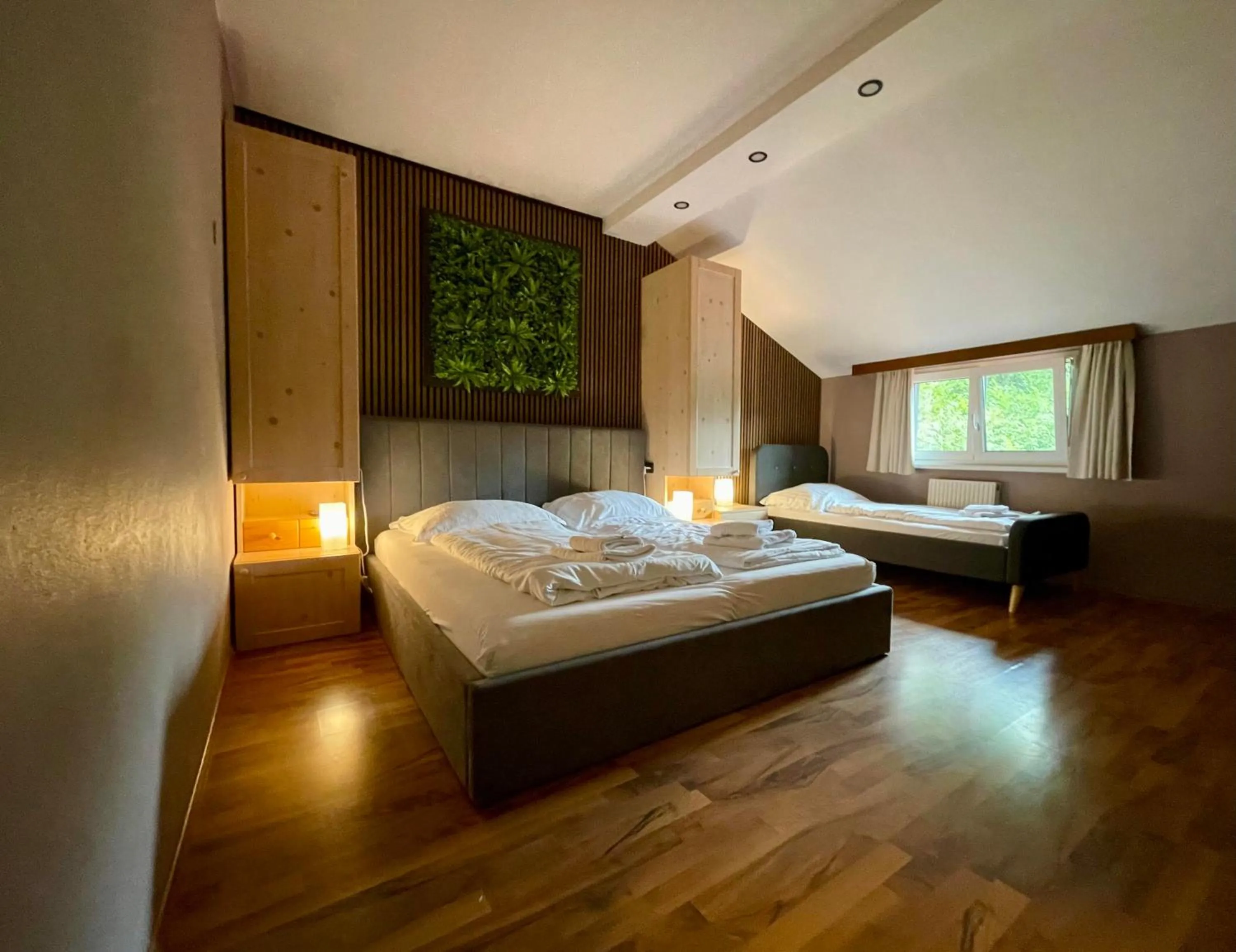 Bed in The Art and Sporthotel