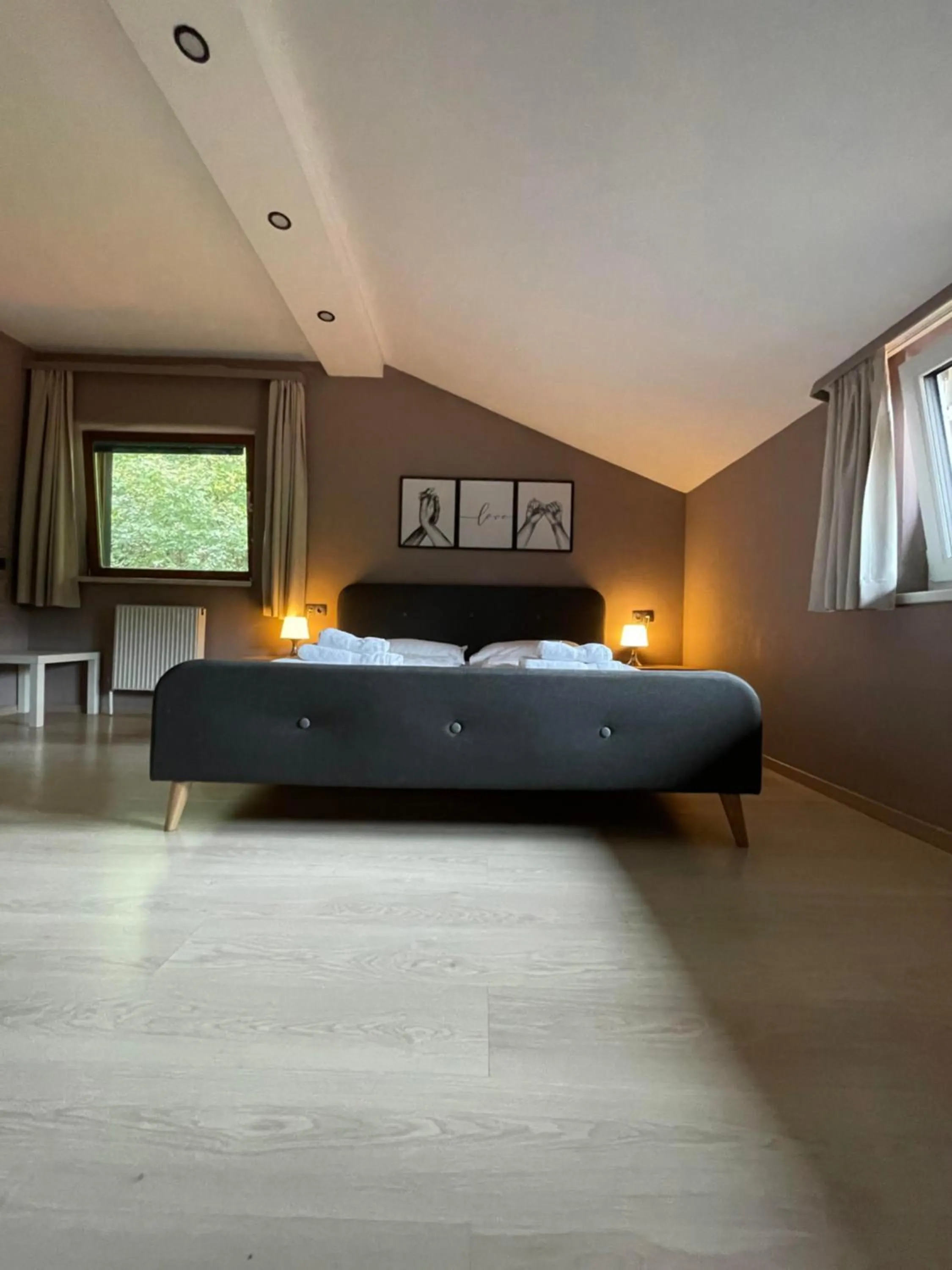 Bed in The Art and Sporthotel