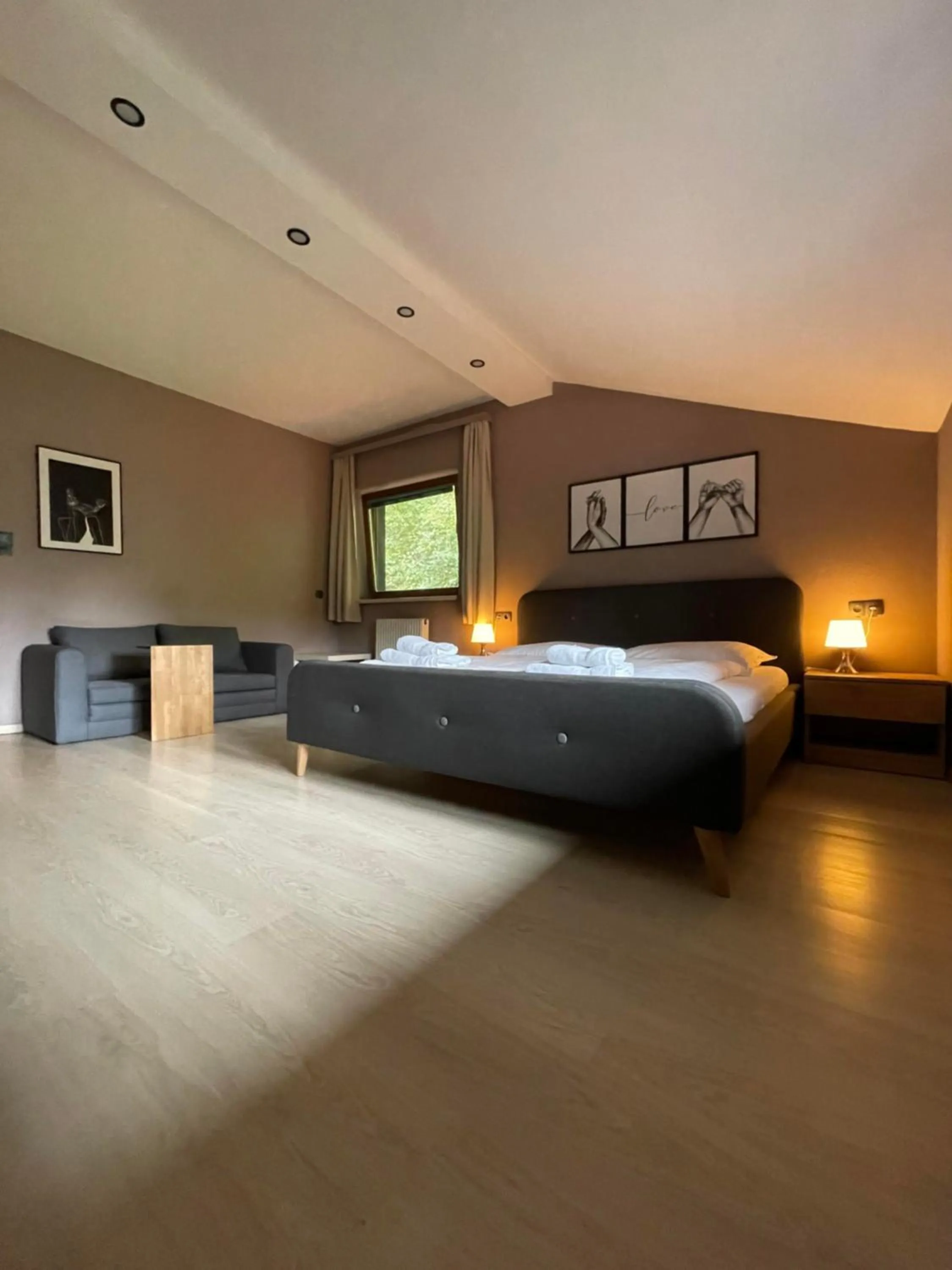 Bed in The Art and Sporthotel