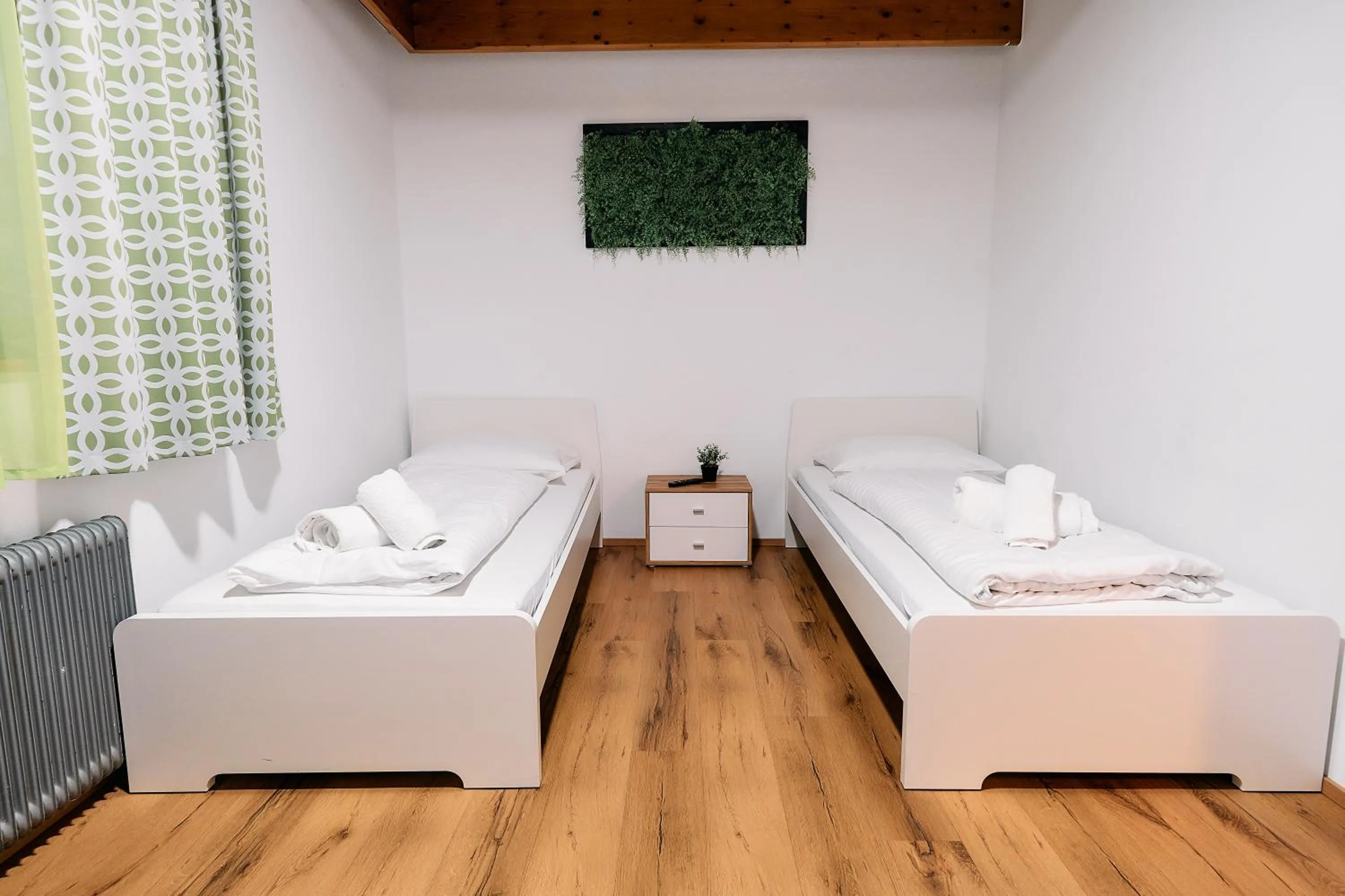 Bed in The Art and Sporthotel