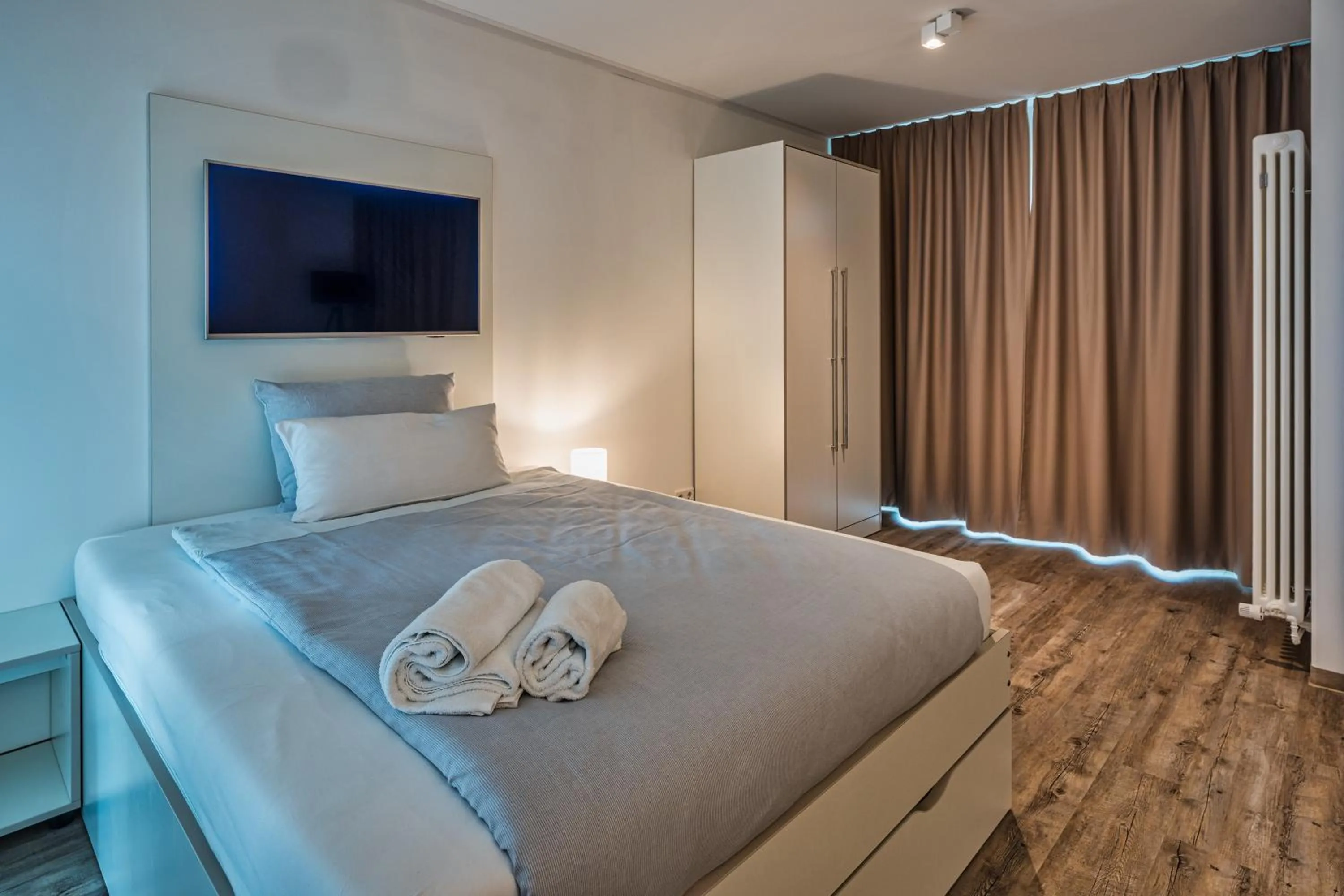 Bed in NorthApartments Dresden am Park