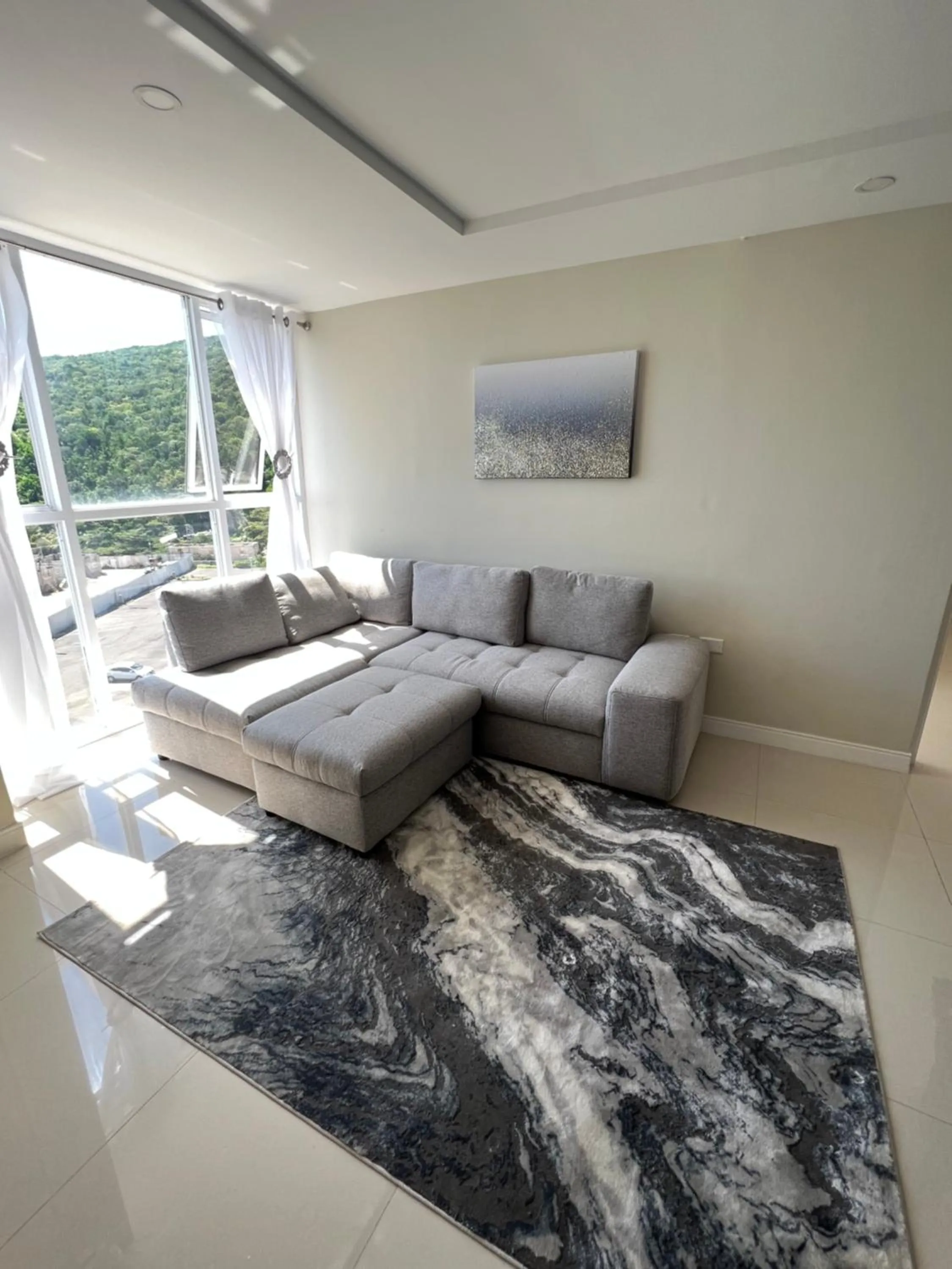 Living room in Large Luxurious Beach Front at Bayfront Villa