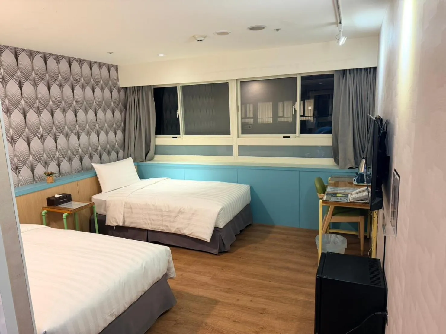 Bed in Ximenhotel-Xining西門大飯店-西寧館