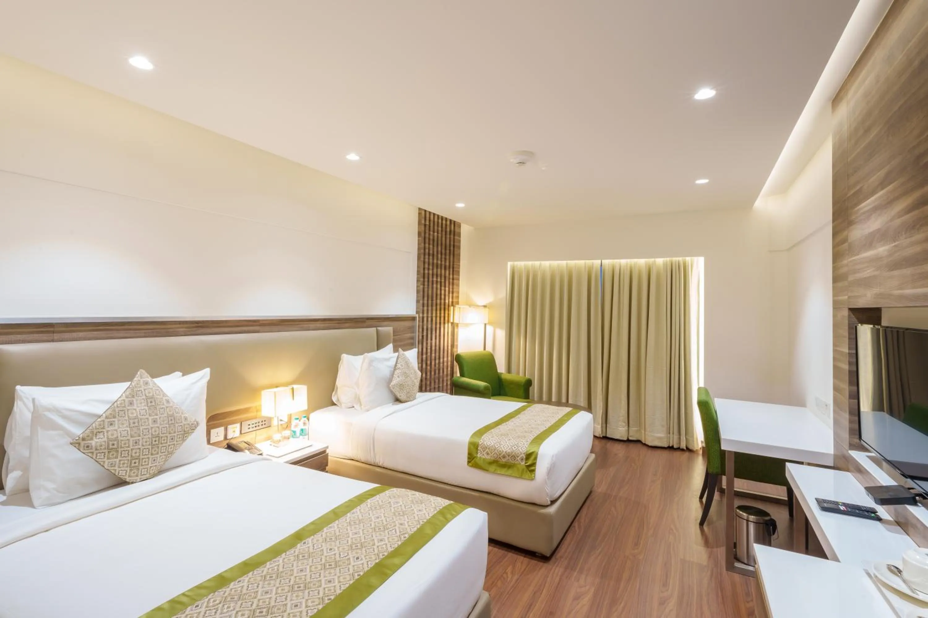 Bed in Pharos Hotels